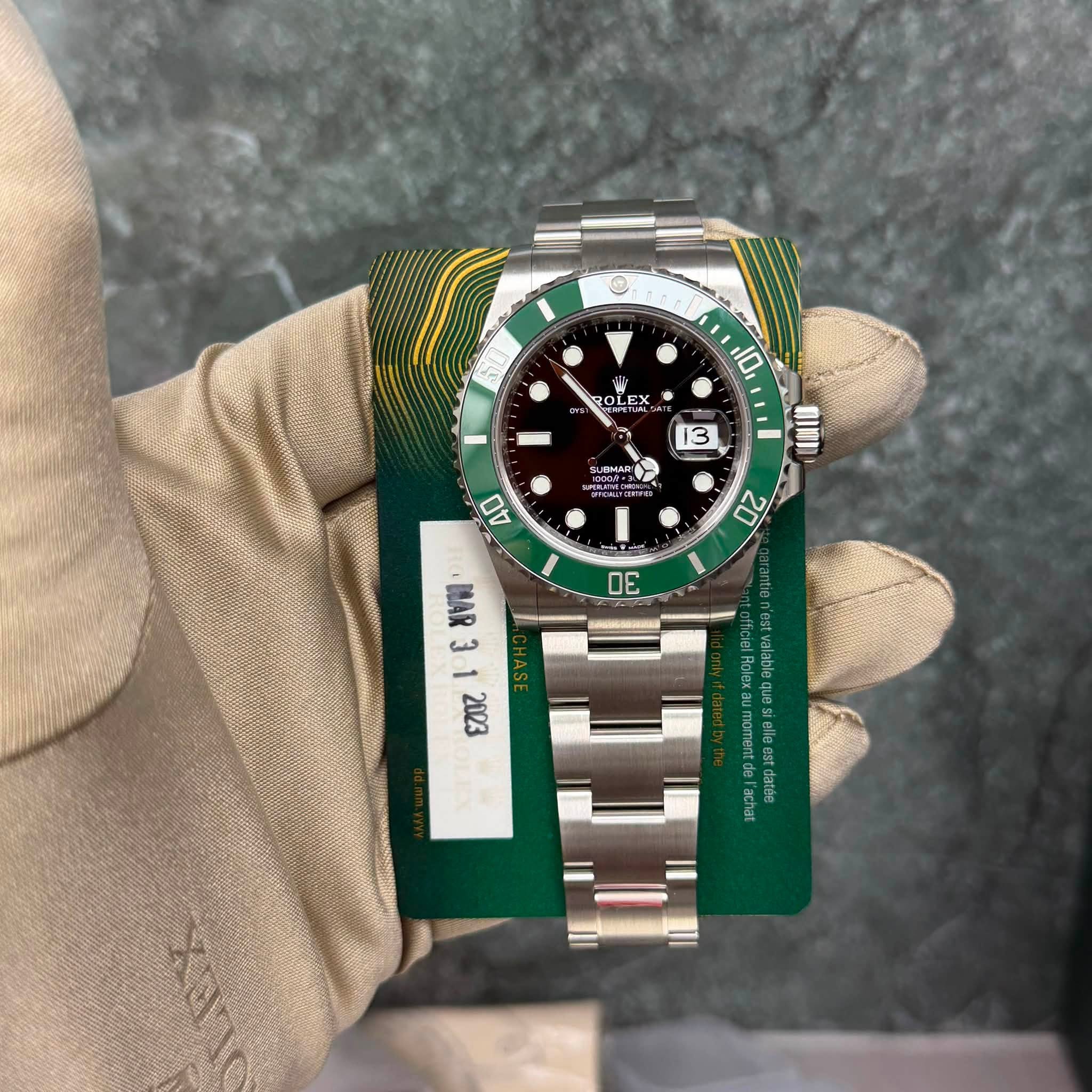 May be an image of wrist watch and text that says 'O ا BOLEA OL a LEX 10 DINN 13 SUBINAG SUBIAR AO 20 3 MAR 3 3 شب 1 2023'