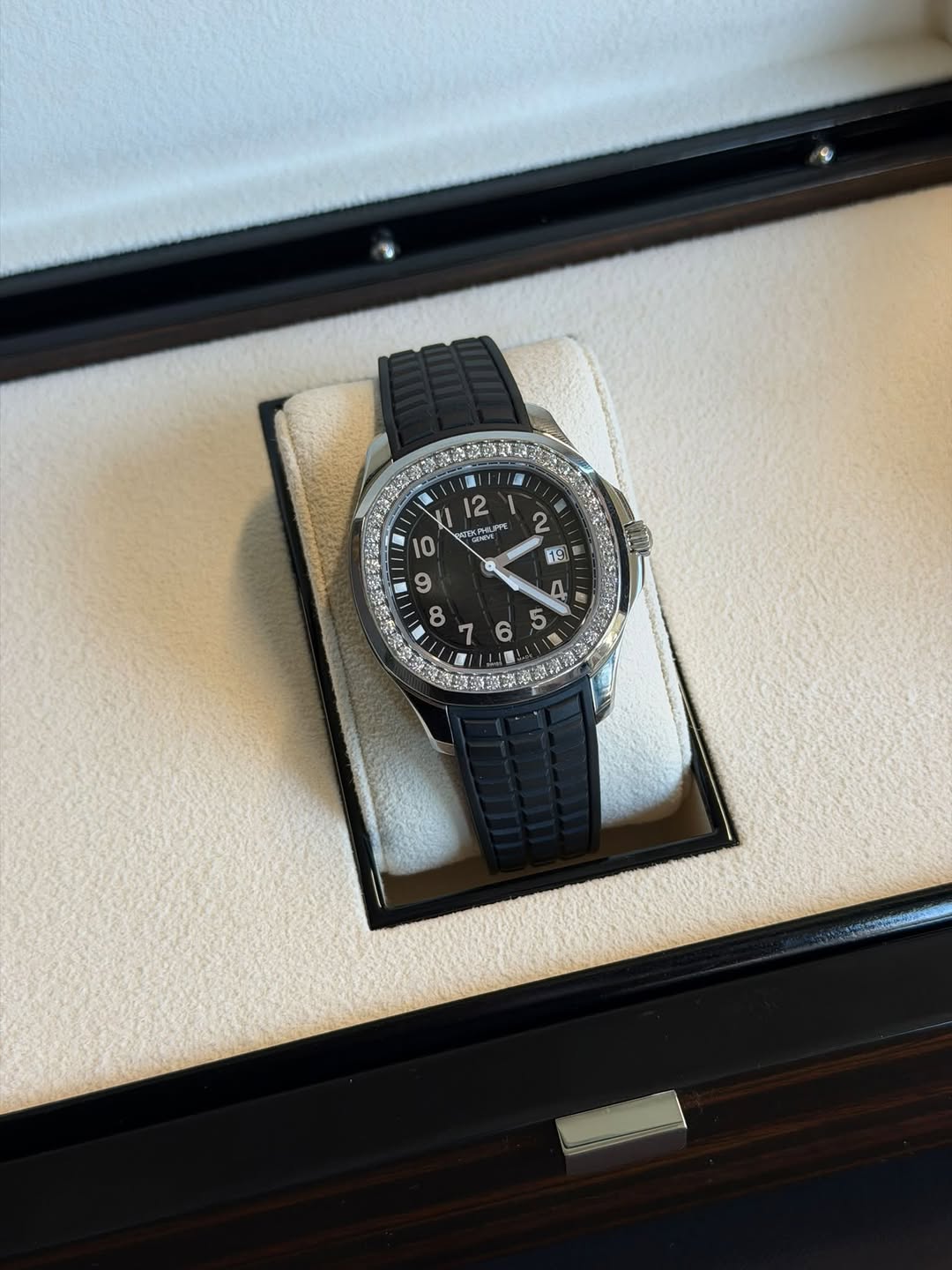 May be an image of wrist watch and text