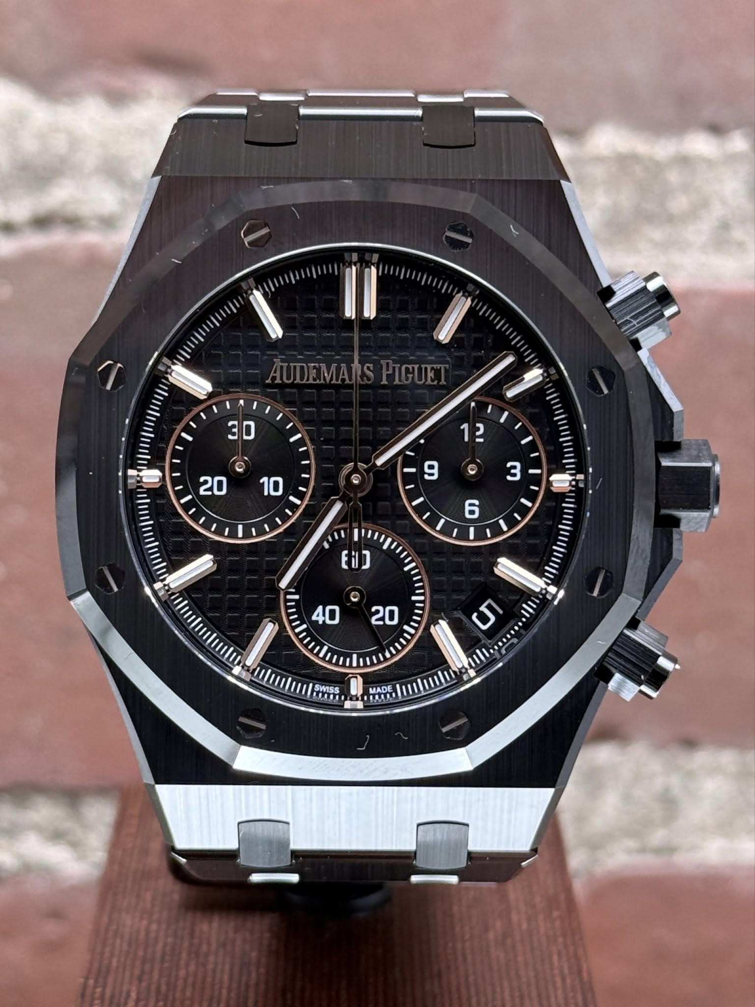 May be an image of wrist watch and text