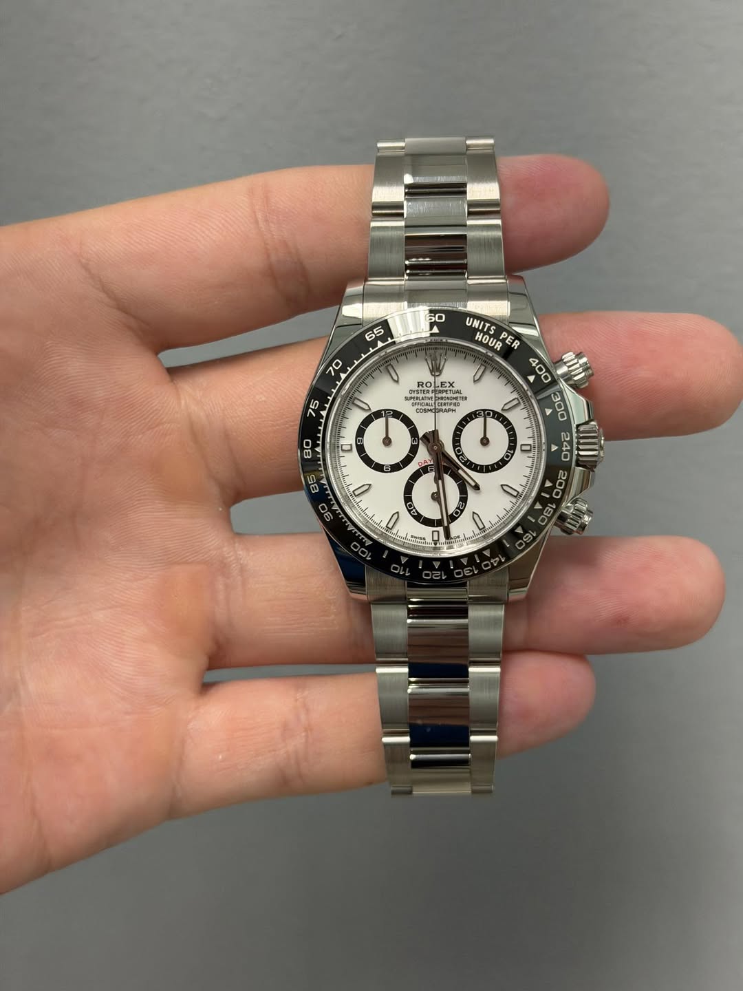 May be an image of wrist watch and text