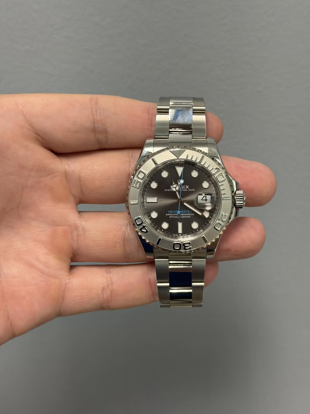 May be an image of wrist watch and text