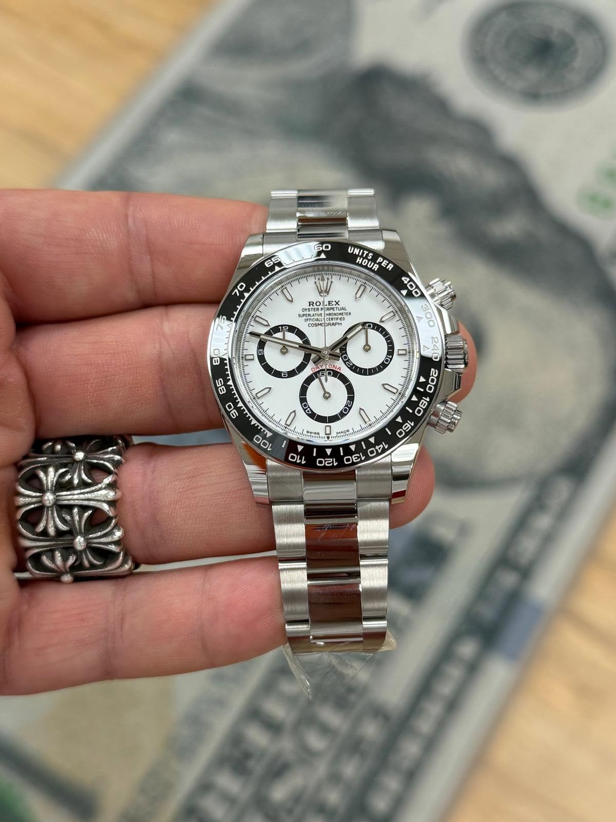 May be an image of wrist watch and text