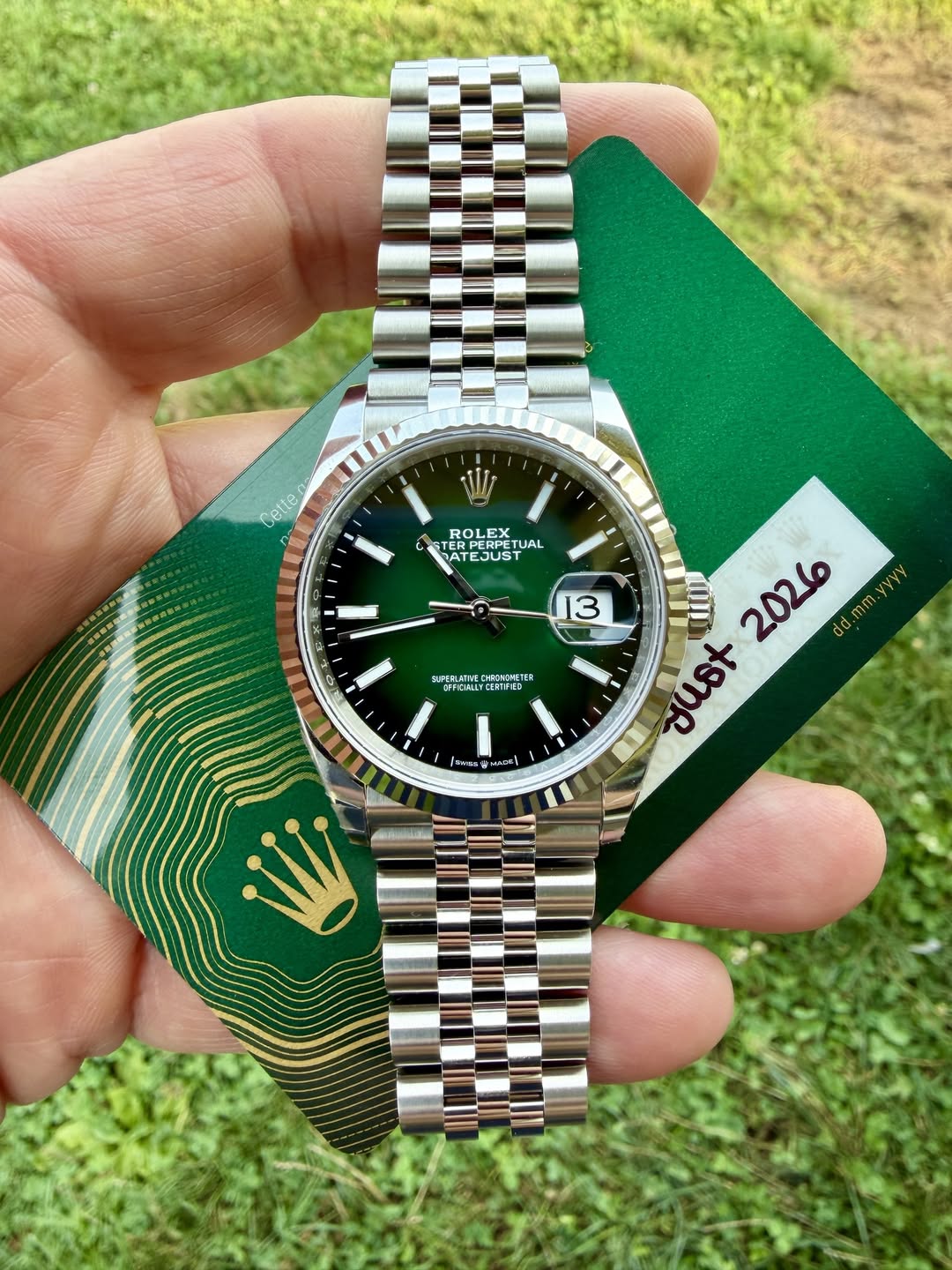 May be an image of wrist watch and text