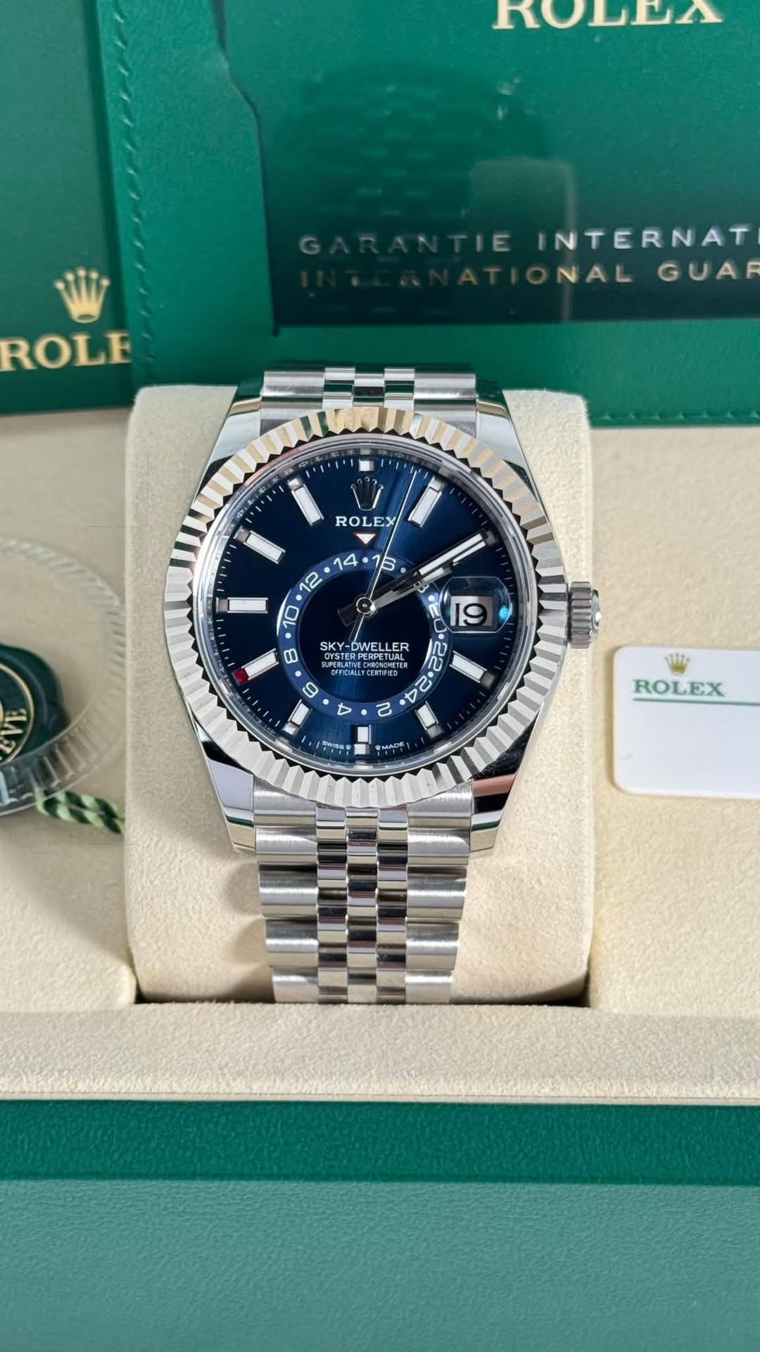 May be an image of wrist watch and text