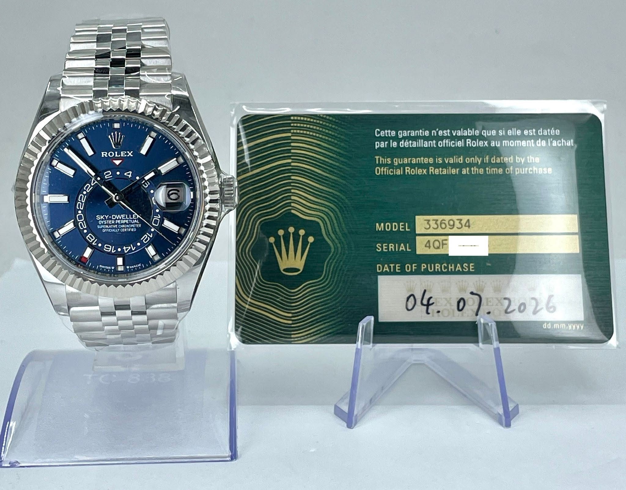 May be an image of wrist watch and text that says '١۰۱ ROLEX EX ROL TII 4 2 4 Y S Cette garantie n'est estvalable que par détaillant officiel Rolex O SISTEN Y-DWELLI KIesT DWEL…