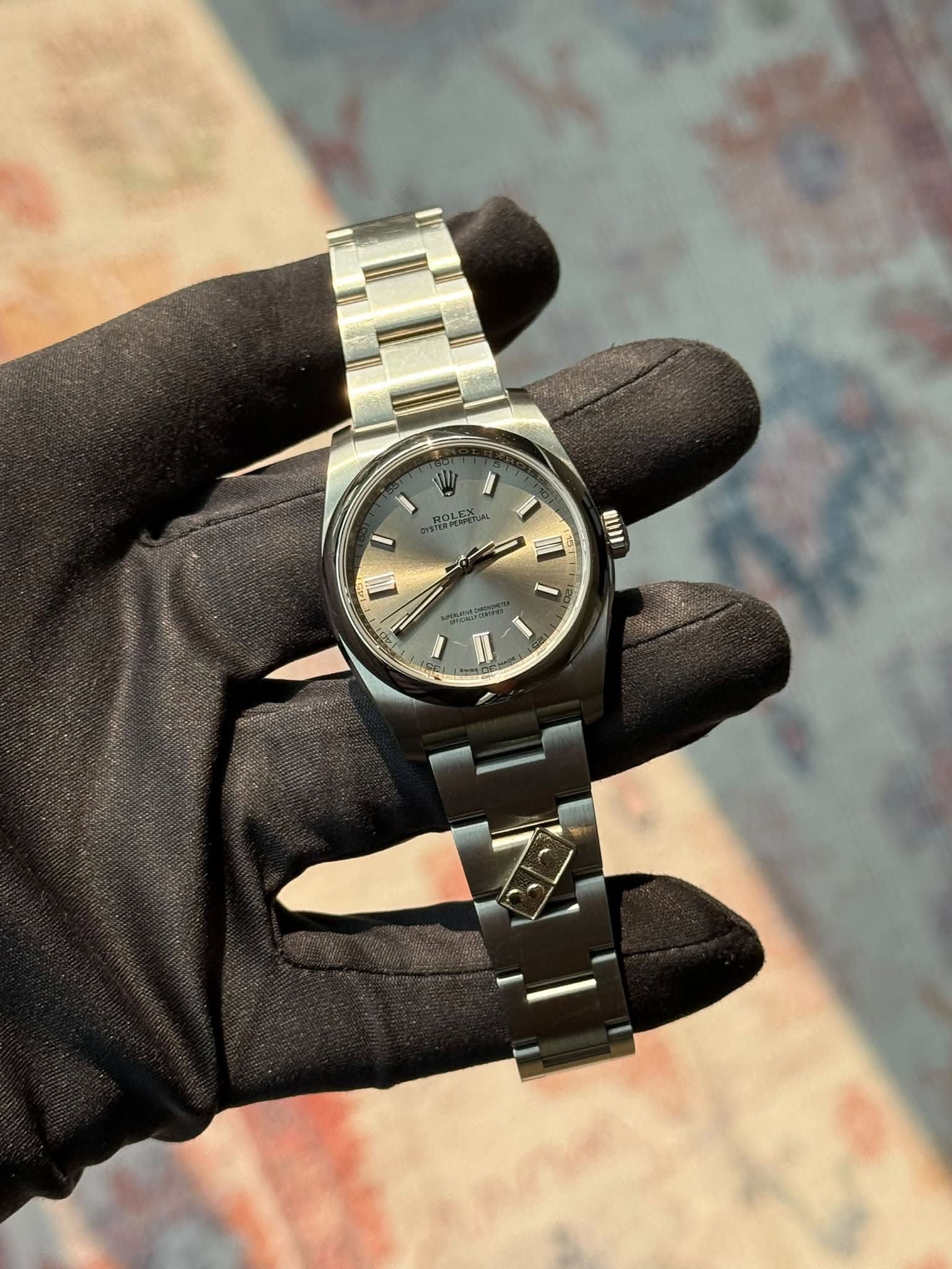 May be an image of wrist watch and text