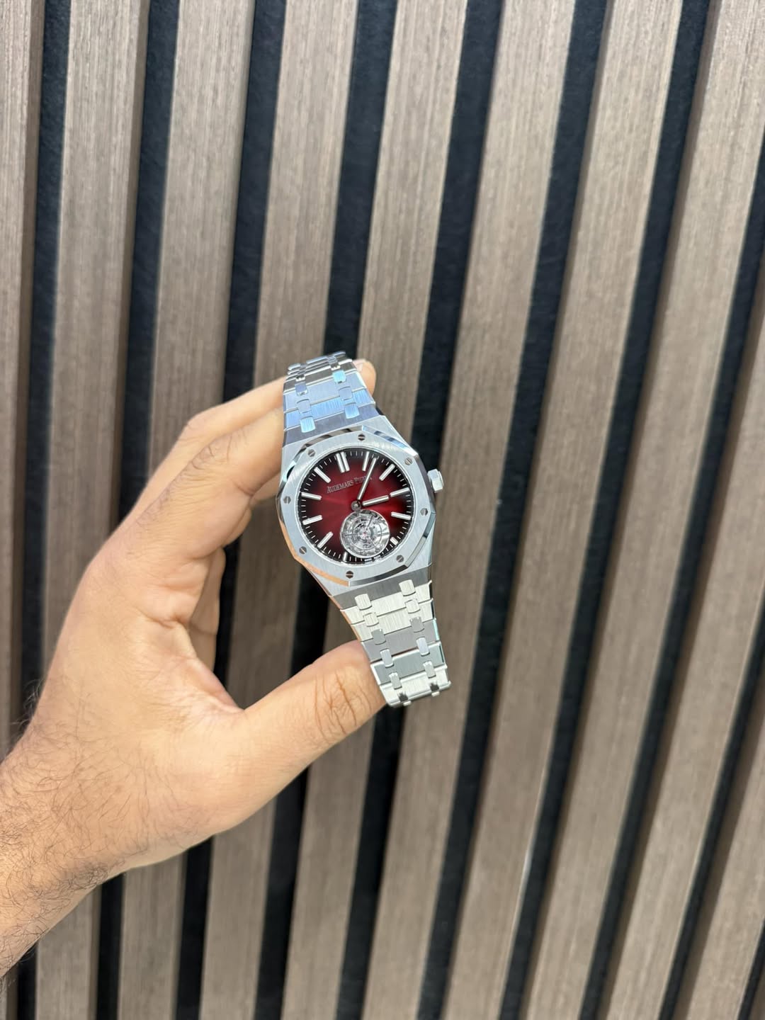 May be an image of wrist watch and text