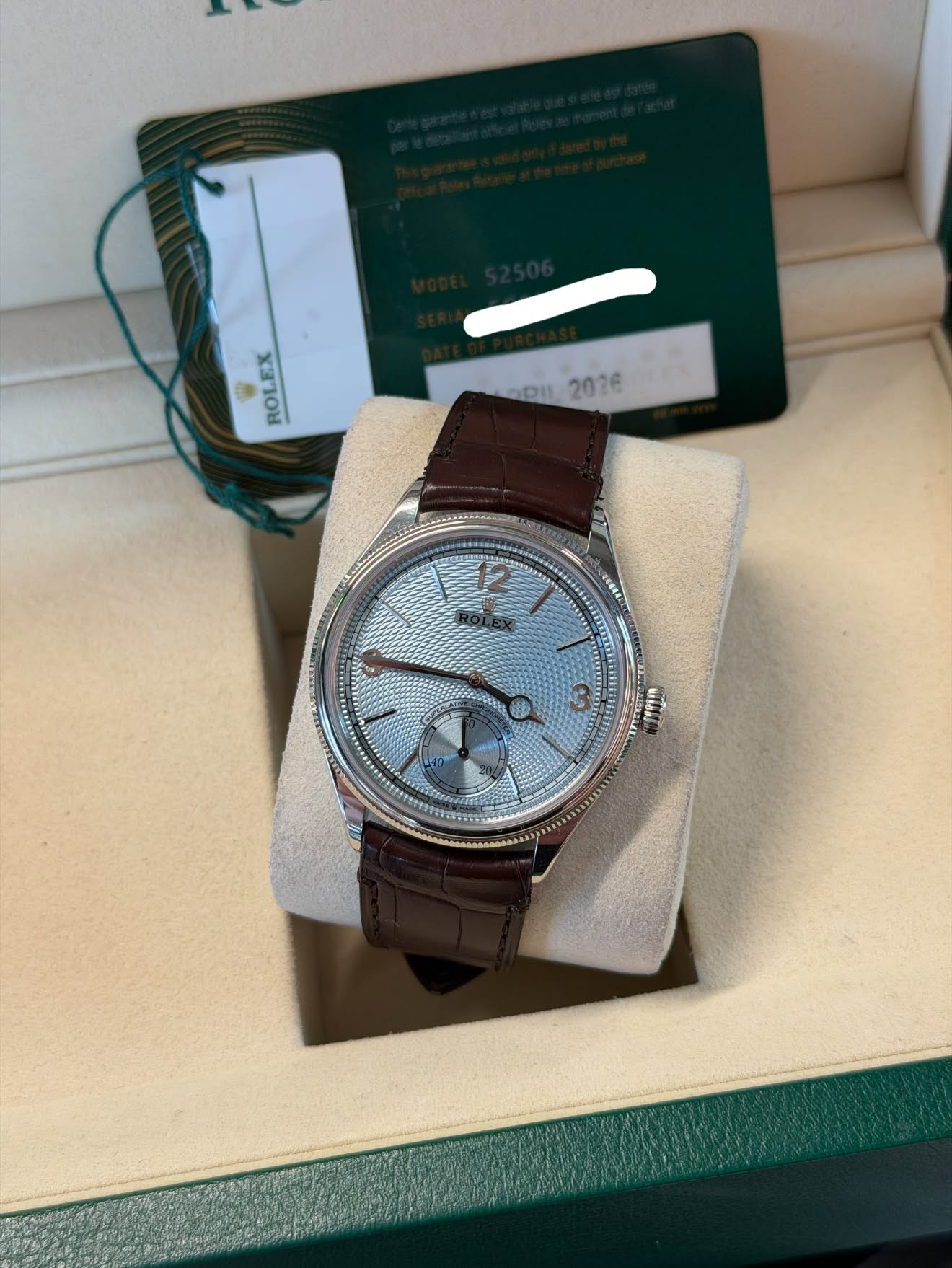 May be an image of wrist watch and text