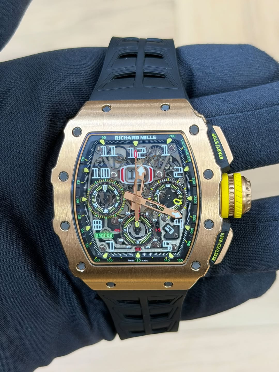 May be an image of wrist watch and text