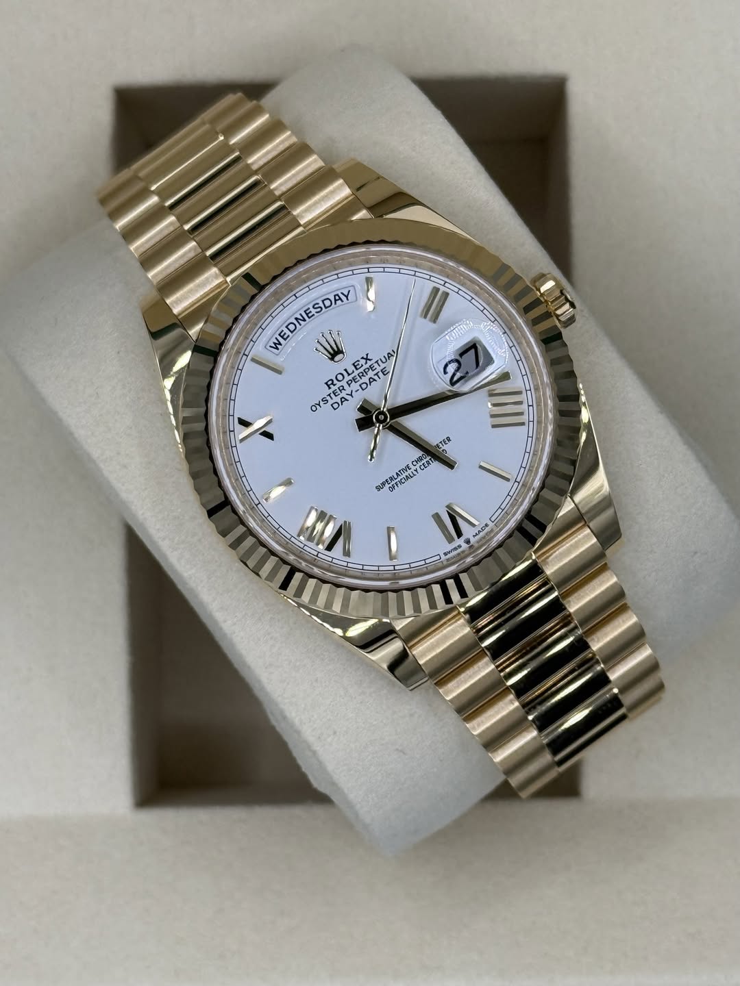 May be an image of wrist watch and text