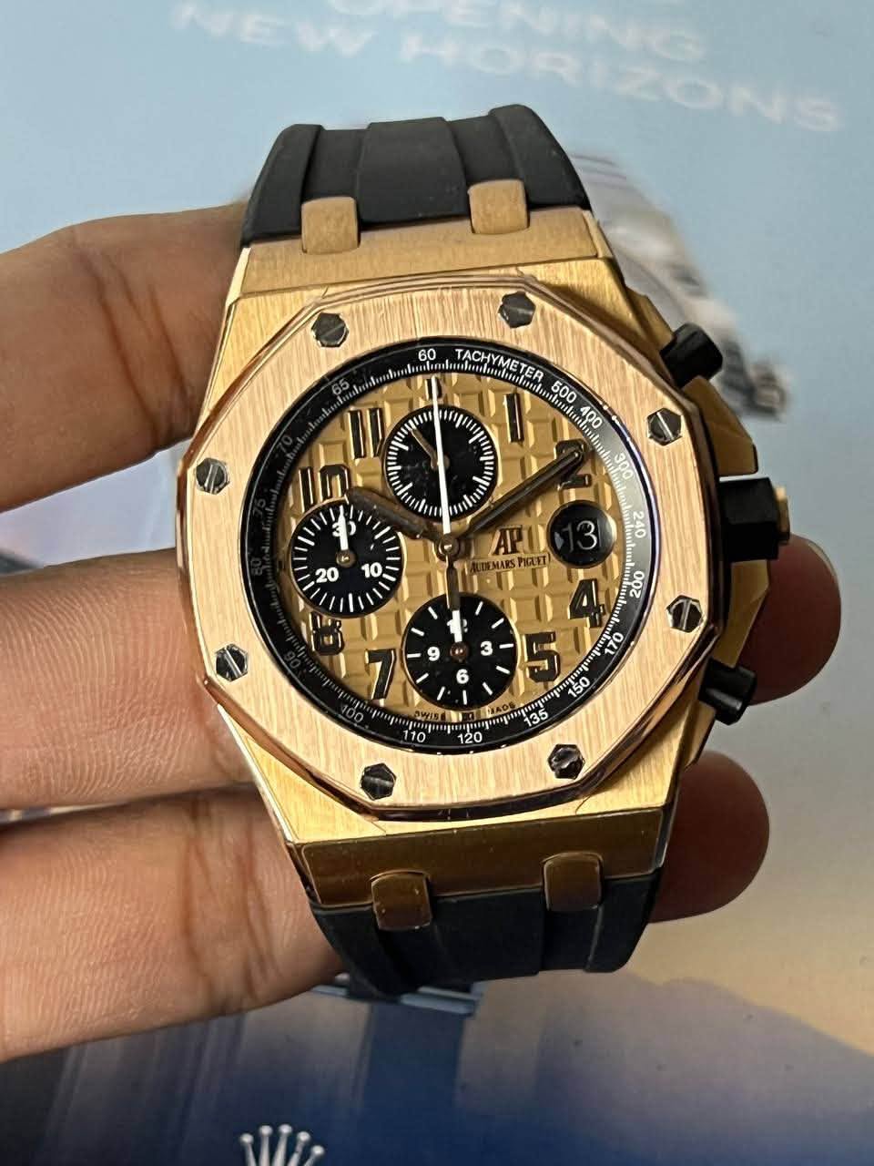 May be an image of wrist watch and text