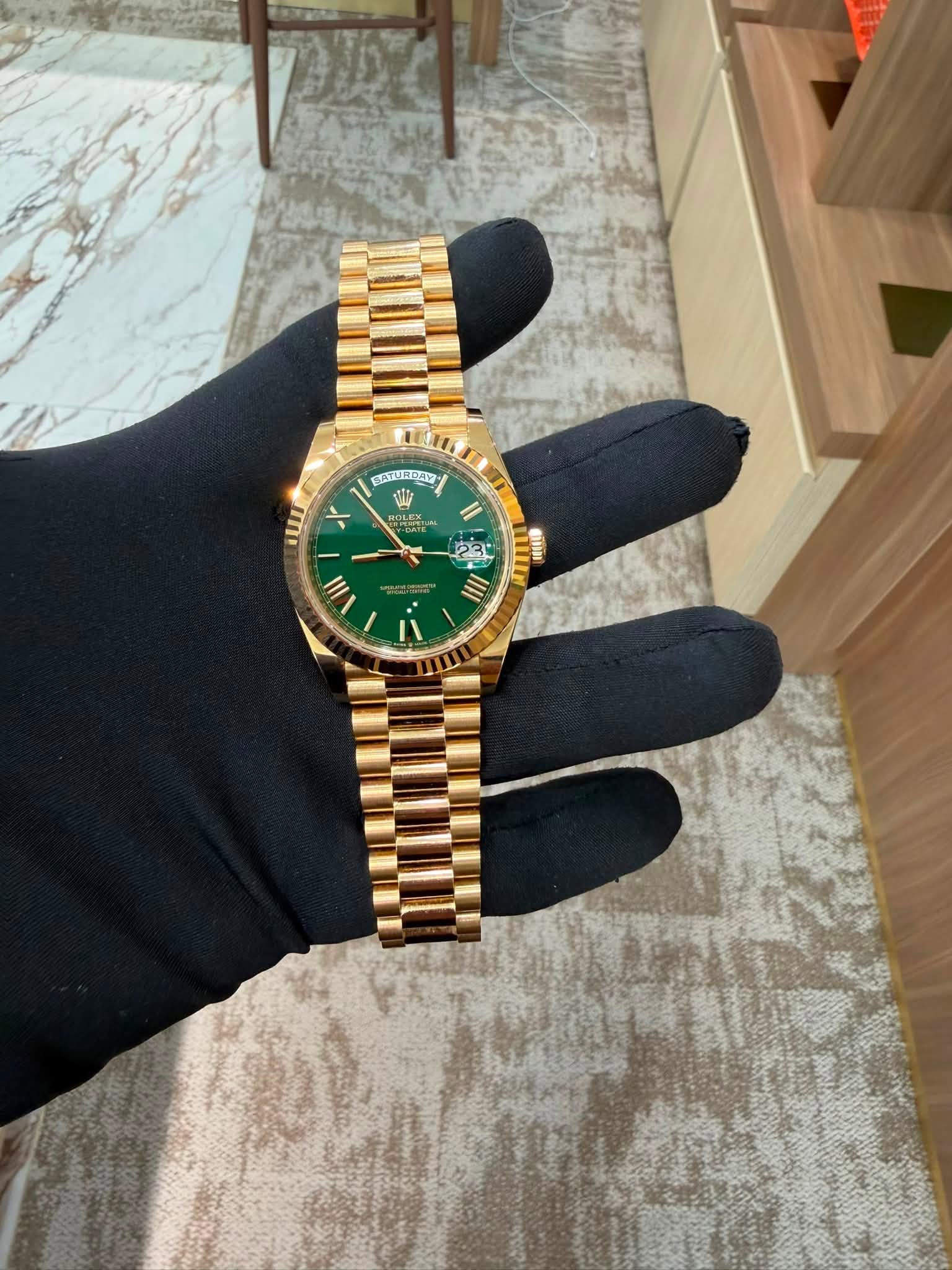 May be an image of wrist watch and text