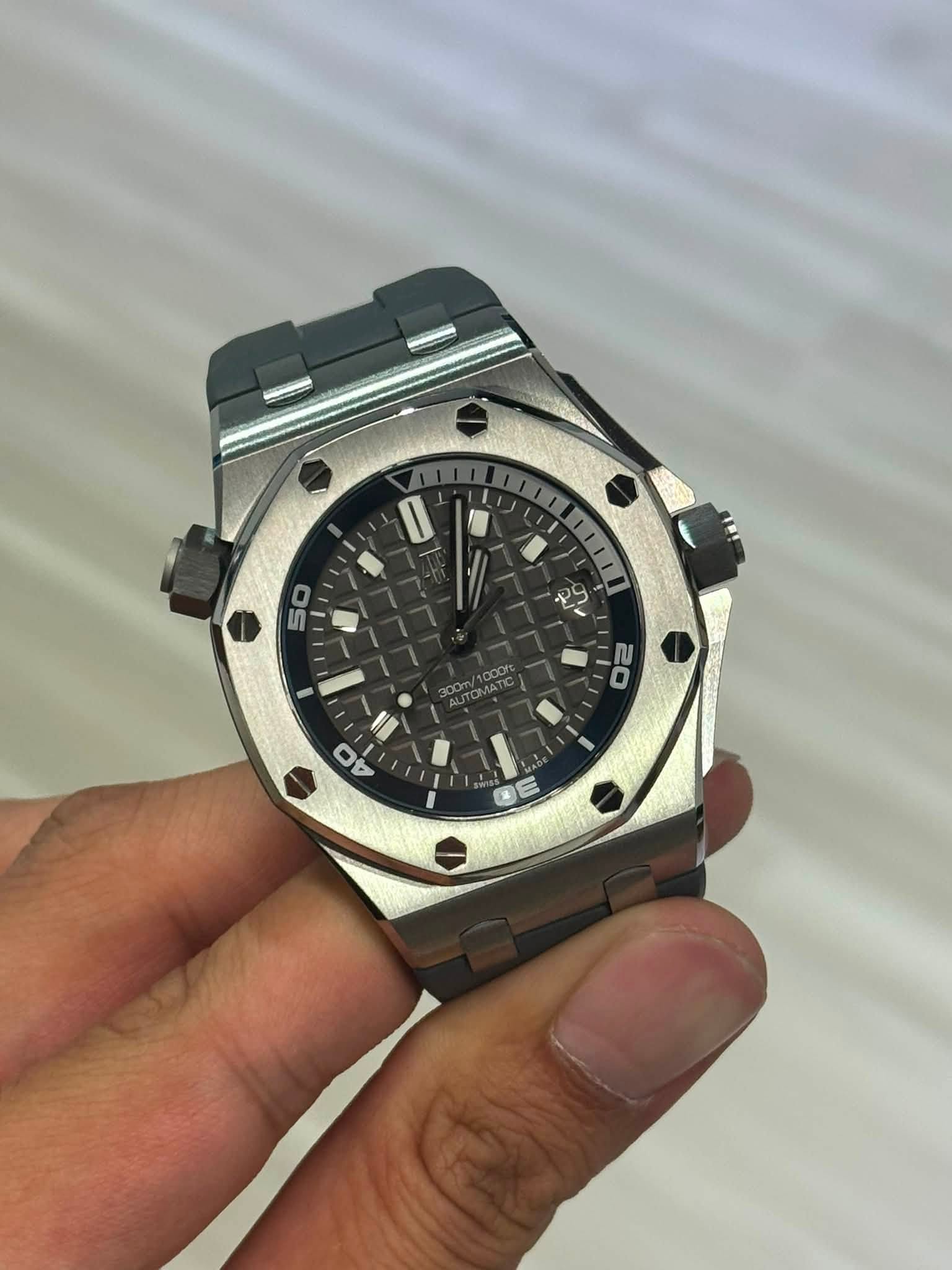 May be an image of wrist watch and text