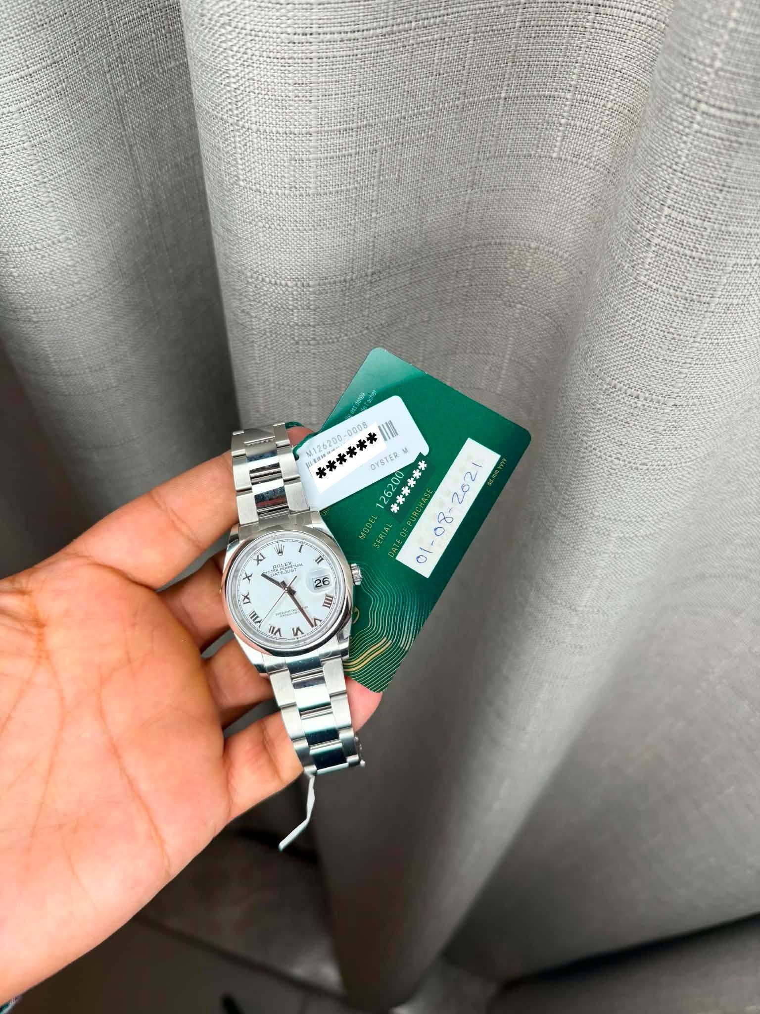 May be an image of digital watch and text