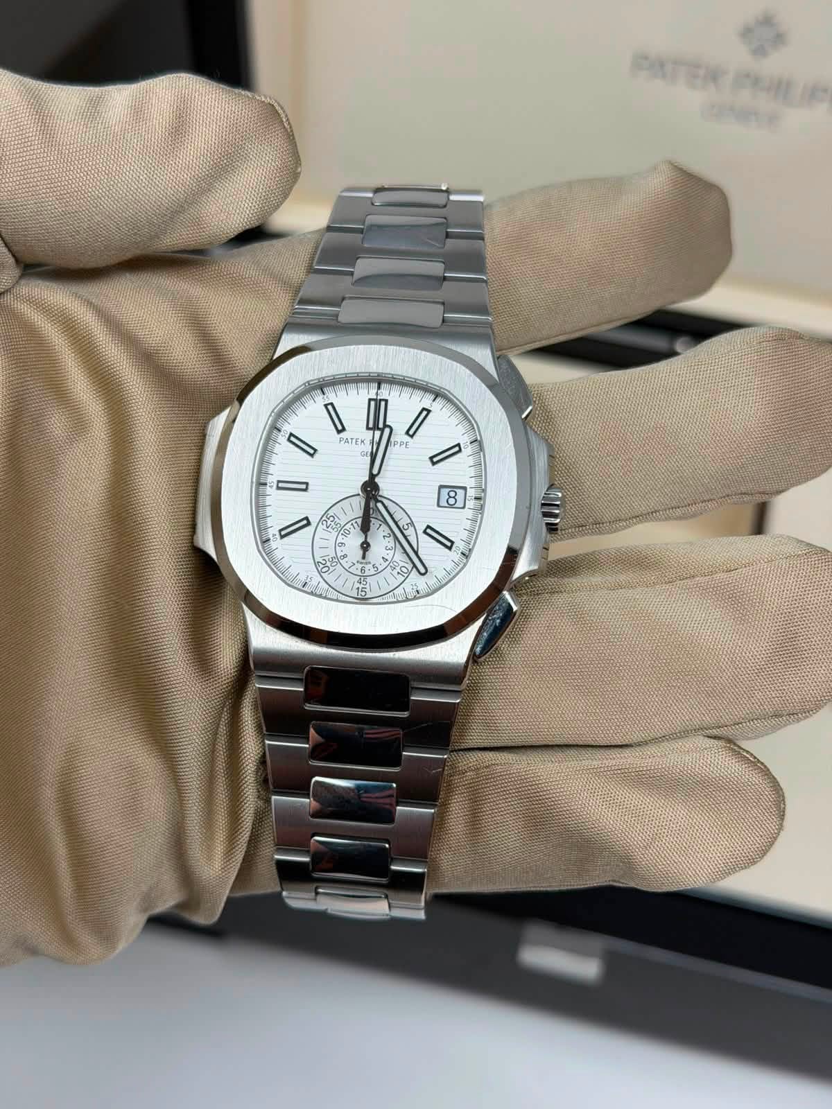 May be an image of wrist watch and text