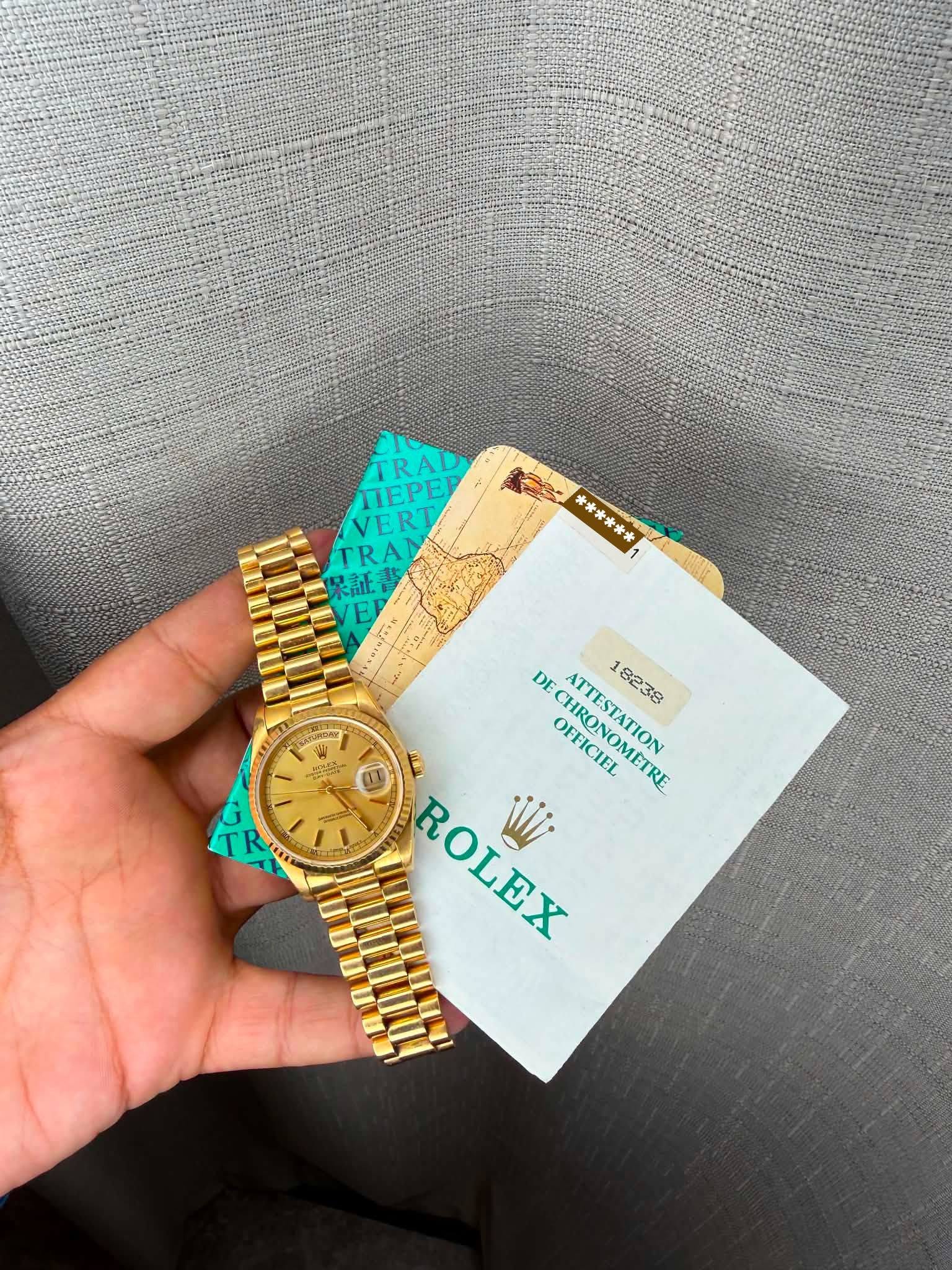May be an image of wrist watch and text that says 'TRAD nEPEΡ VERT TRAN 保証書 *冷米*** 神老米 볶볶에 DE 8 OFFICIEL OFFNOMA HRONOMETRE ETRE TTESTATION 18238 CHRONOMETRE 18 82 38 ИOИ ROLEX Wi…
