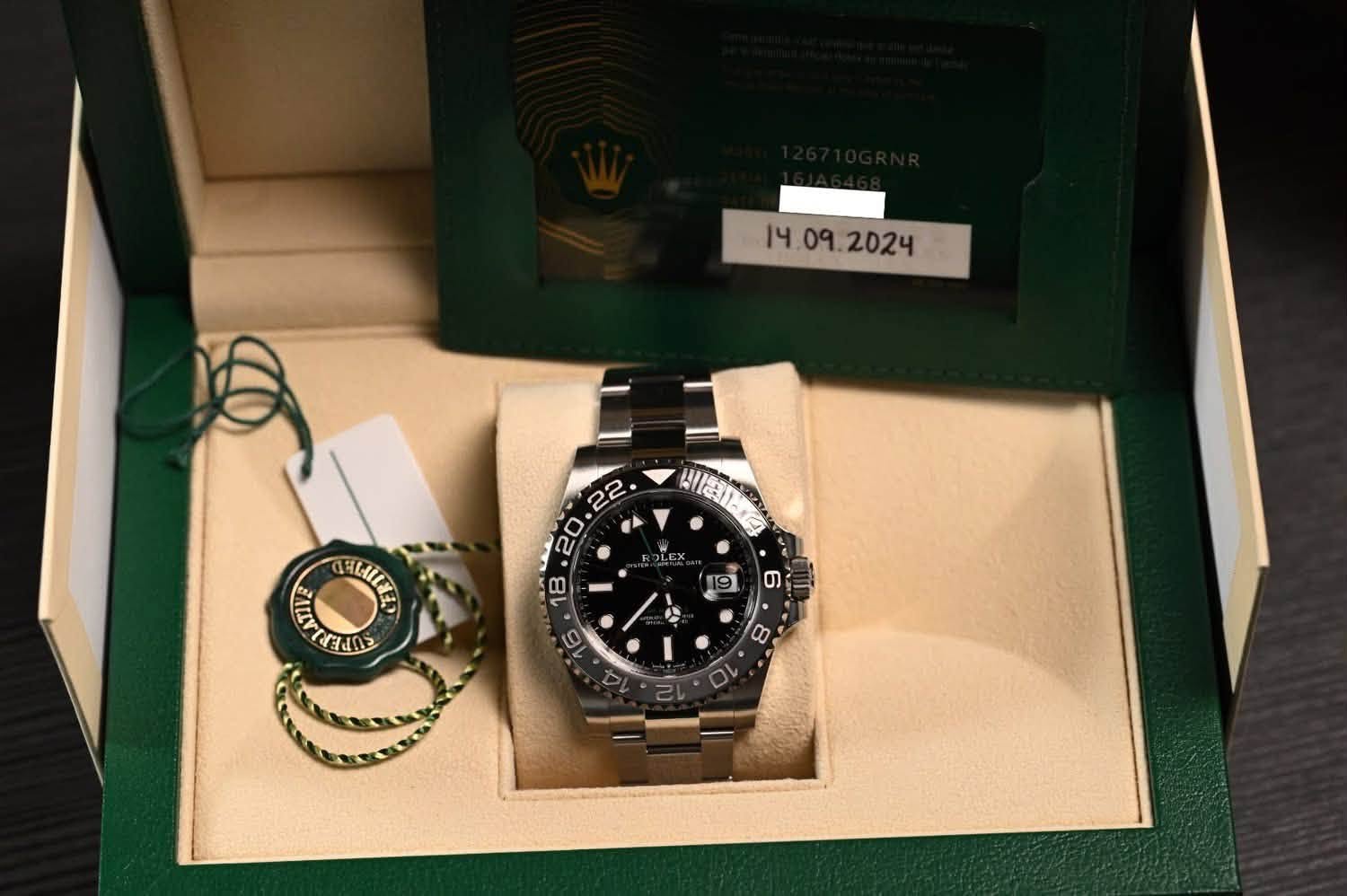 May be an image of wrist watch and text