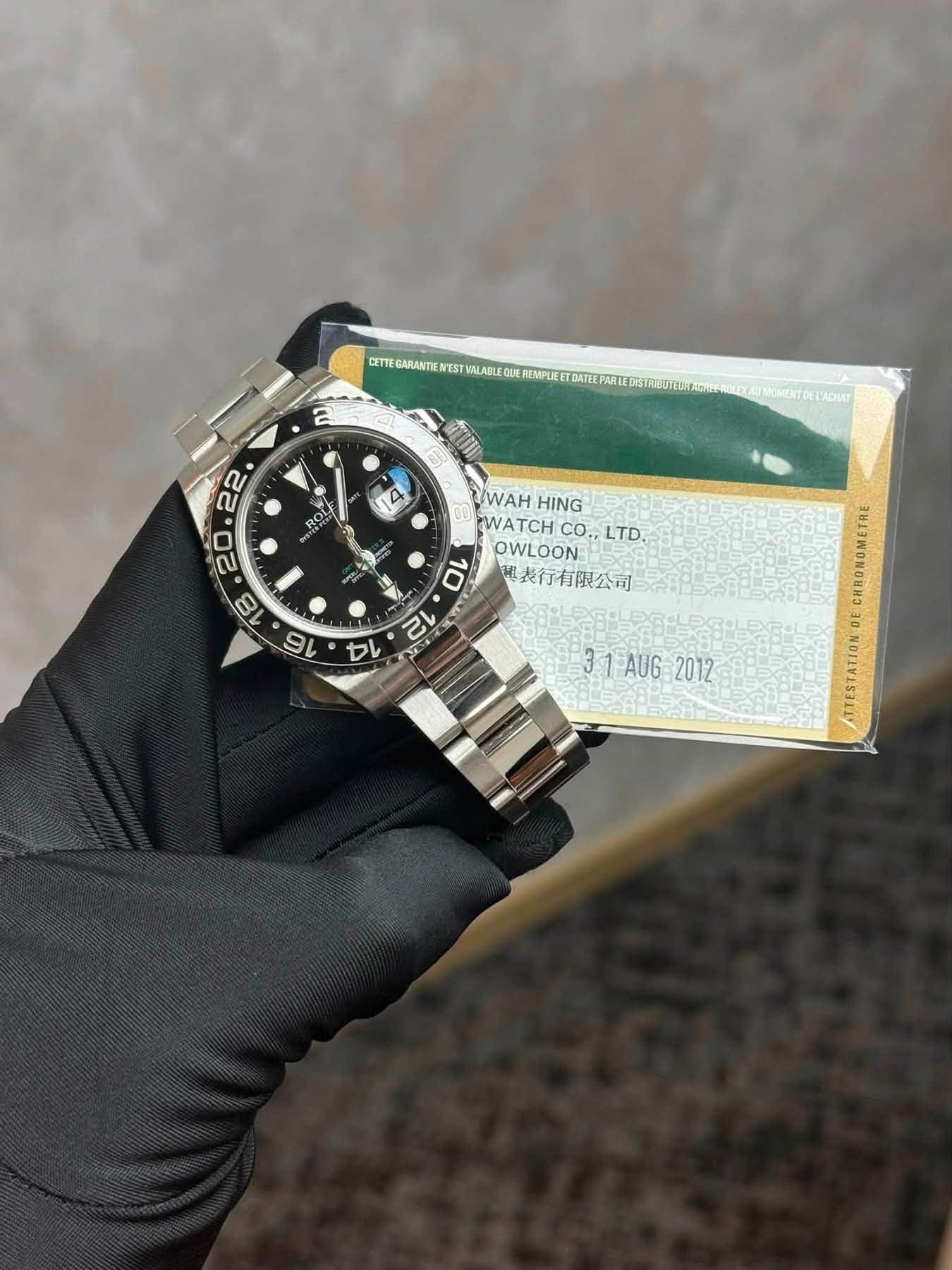 May be an image of wrist watch and text that says 'CETTE GARANTIEN MALABLE 2 FEMPLEETDATE 6 कर০ 只保 /WAH HING WATCH CO., LTD. OWLOON: 電表行有限公司 10 2 本尔 14 31AUG2012 31FAU AUG 2012 3…