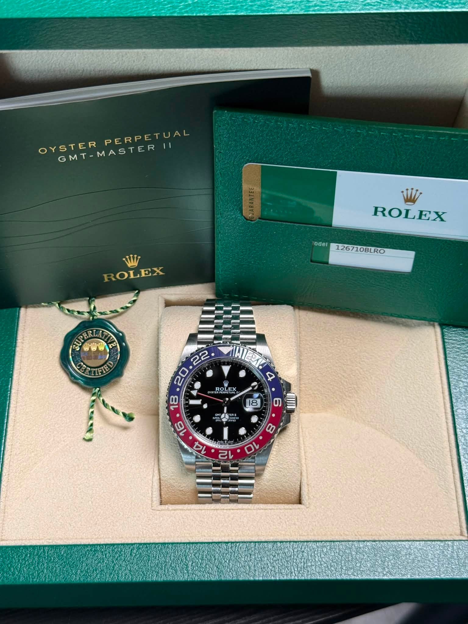 May be an image of wrist watch and text that says 'OYSTER OYSTERASTERTA YSTERPERPETUAL OYSTERMASTER GMT-MASTER| PERPET PERPETUAL TUAL W ROLEX W ROLEX Odel 126710BLRO SUPERI IFTED…