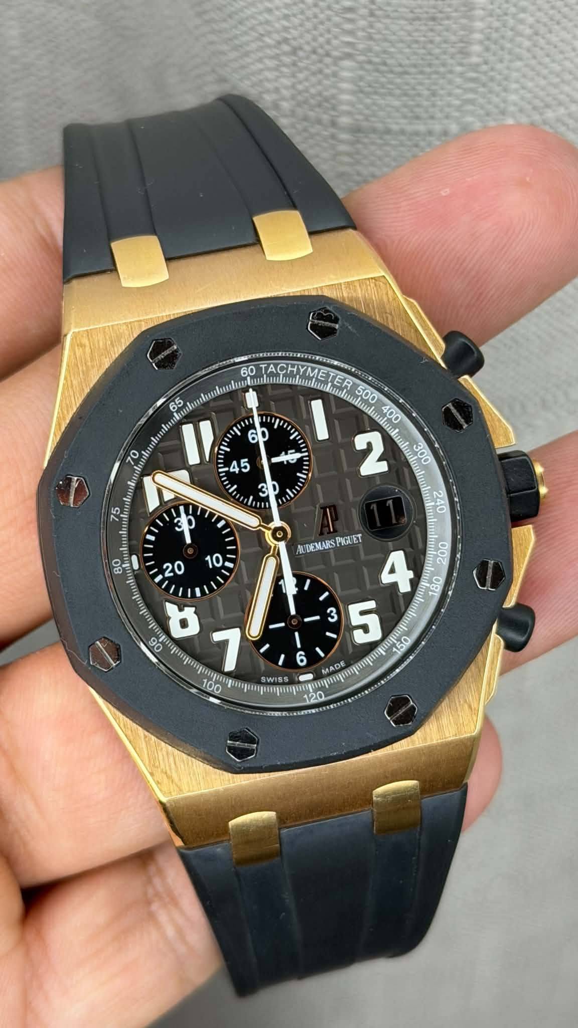 May be an image of wrist watch and text