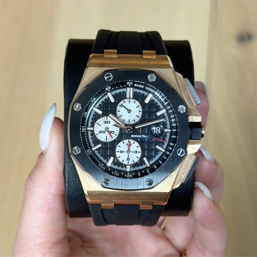 May be an image of wrist watch and text