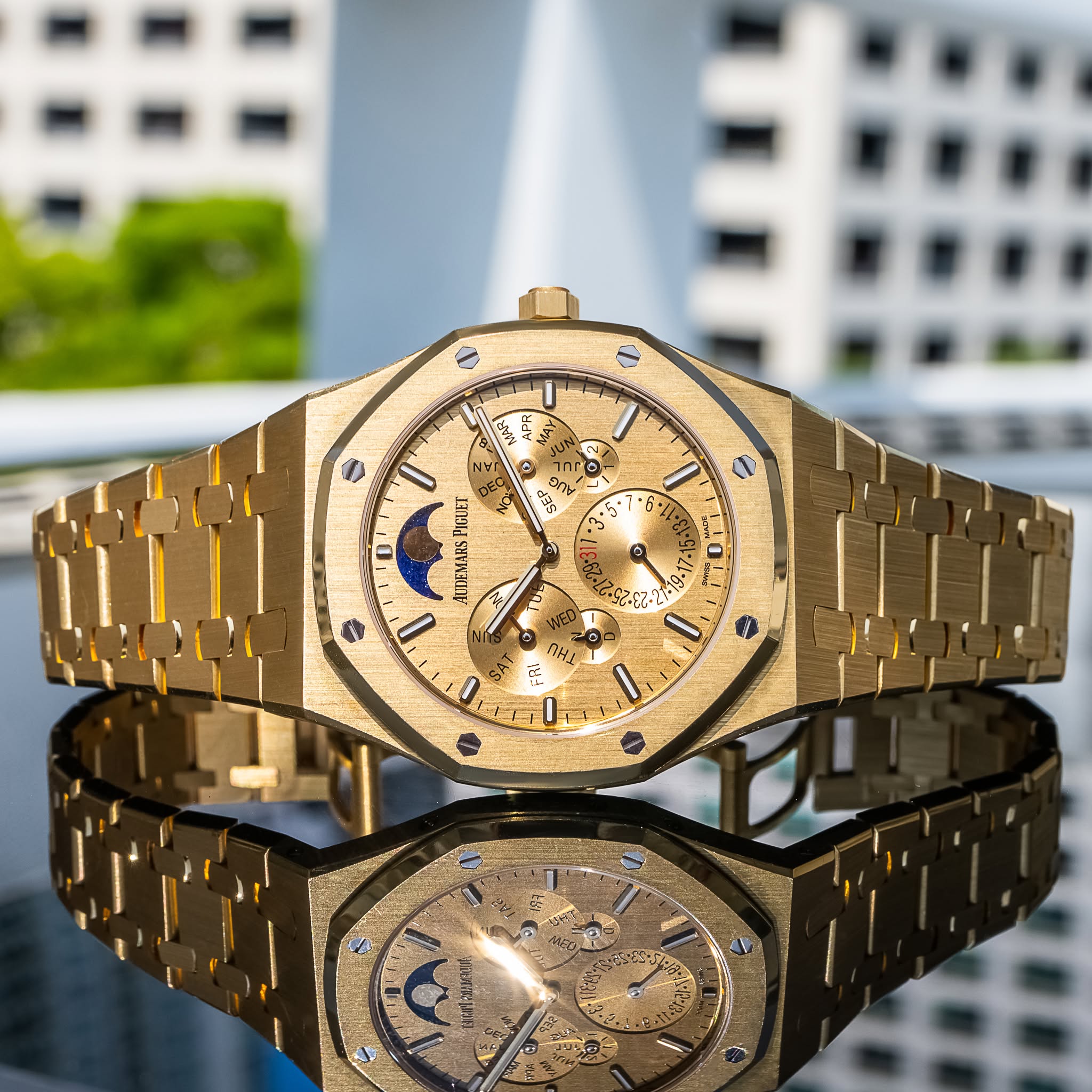 May be an image of wrist watch and text
