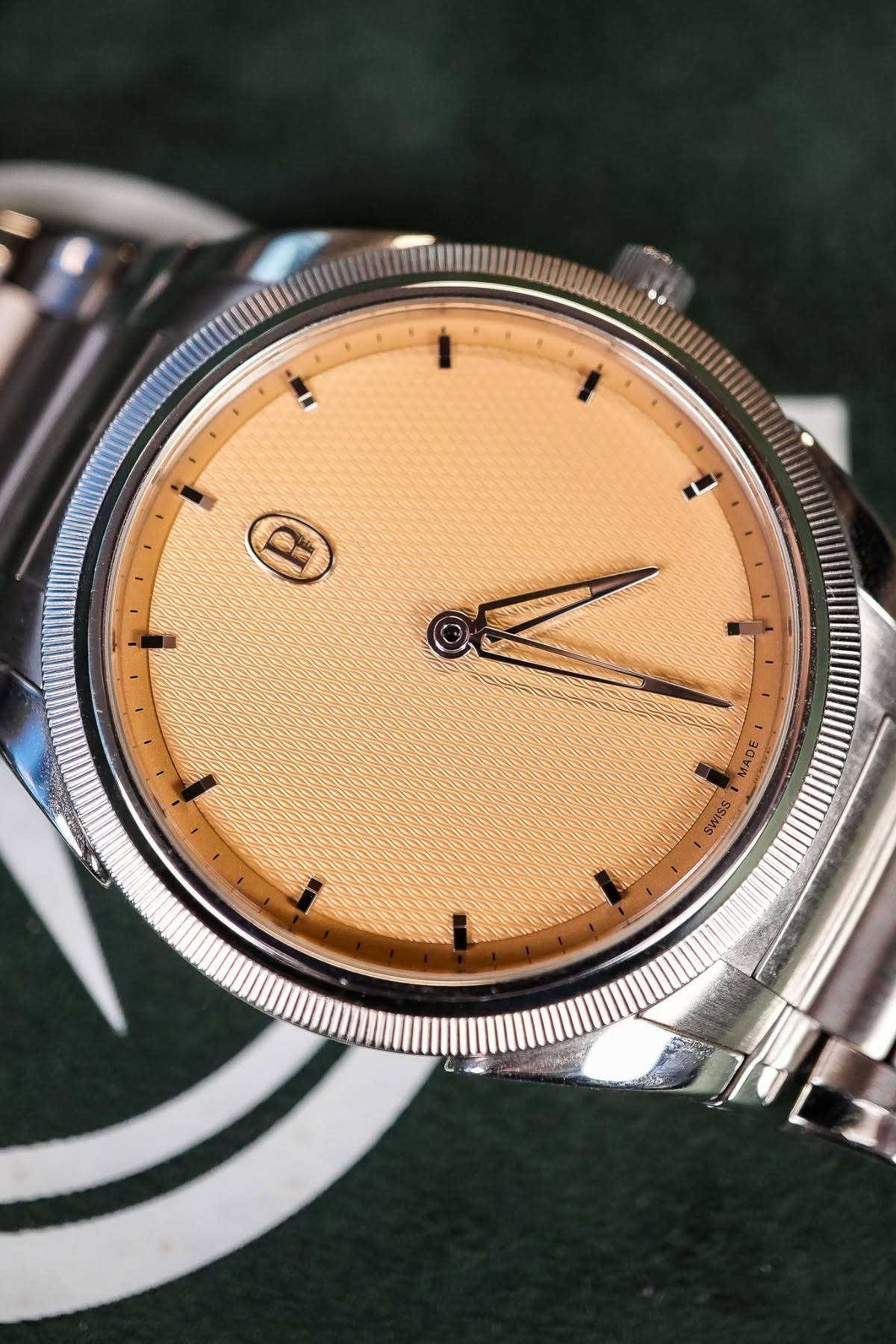 May be an image of wrist watch and text