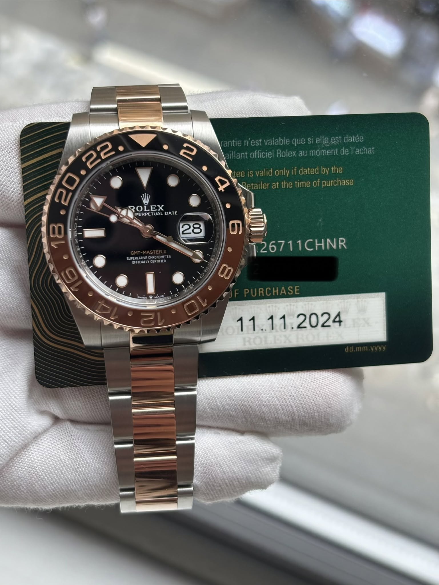 May be an image of wrist watch and text