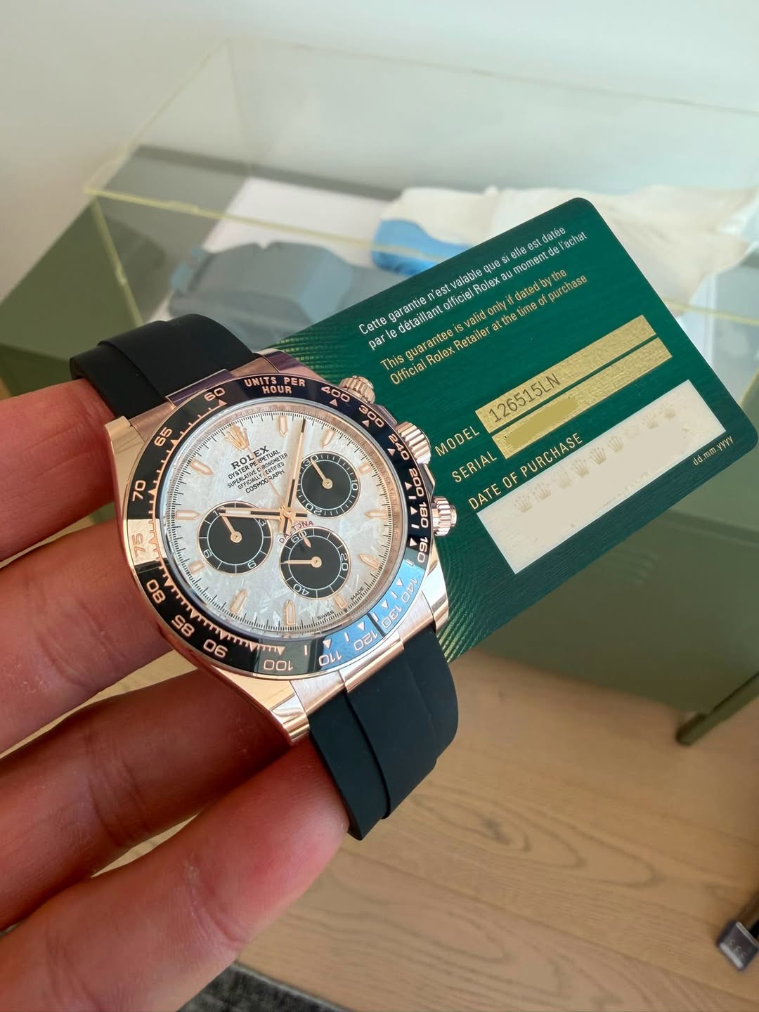 May be an image of wrist watch and text