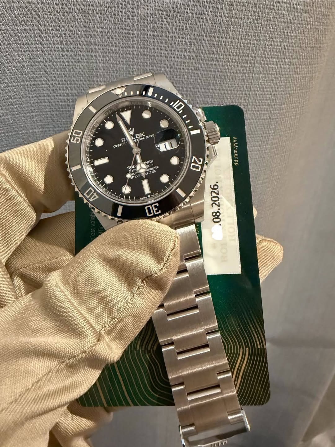 May be an image of wrist watch and text