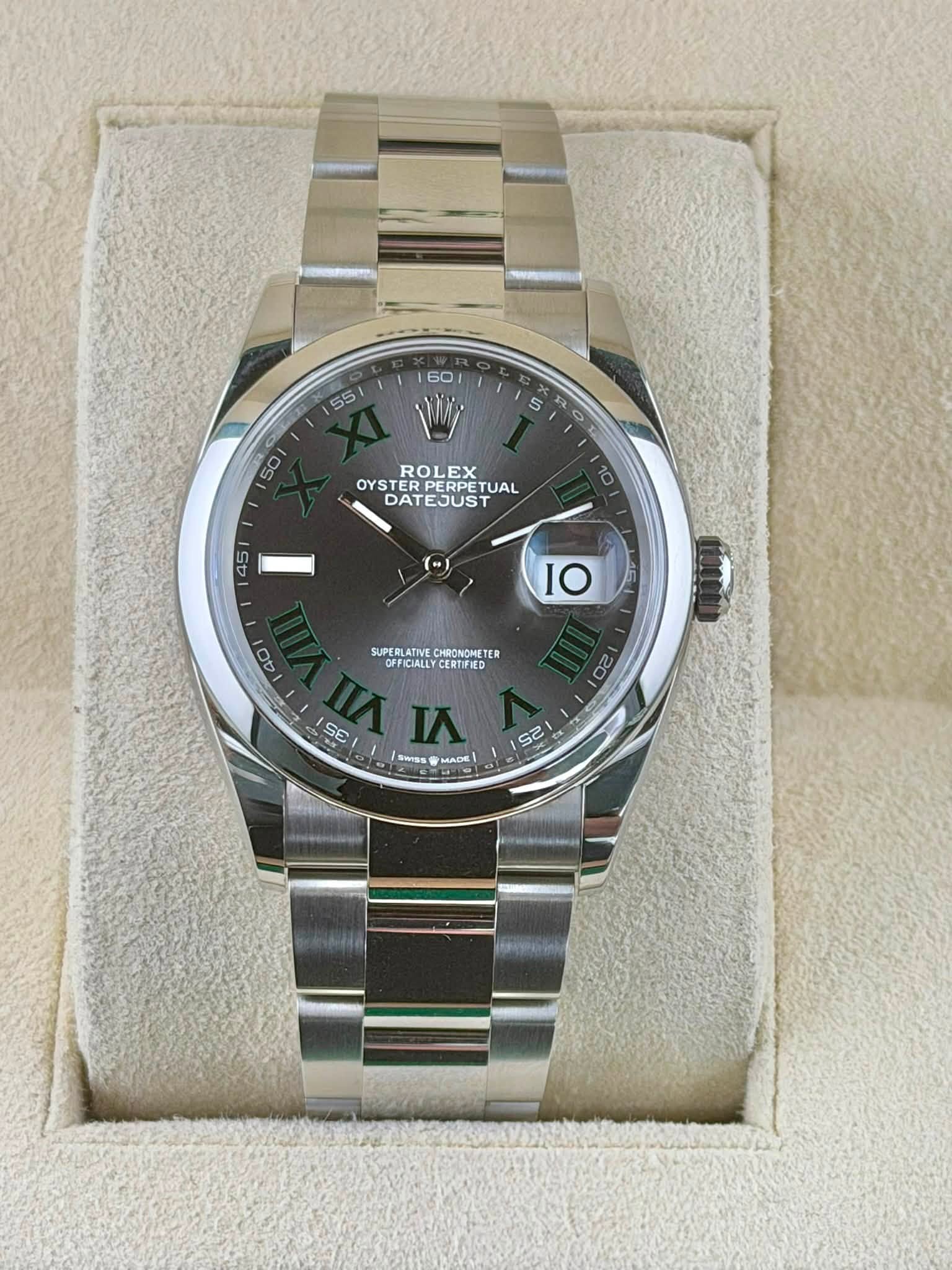 May be an image of wrist watch and text