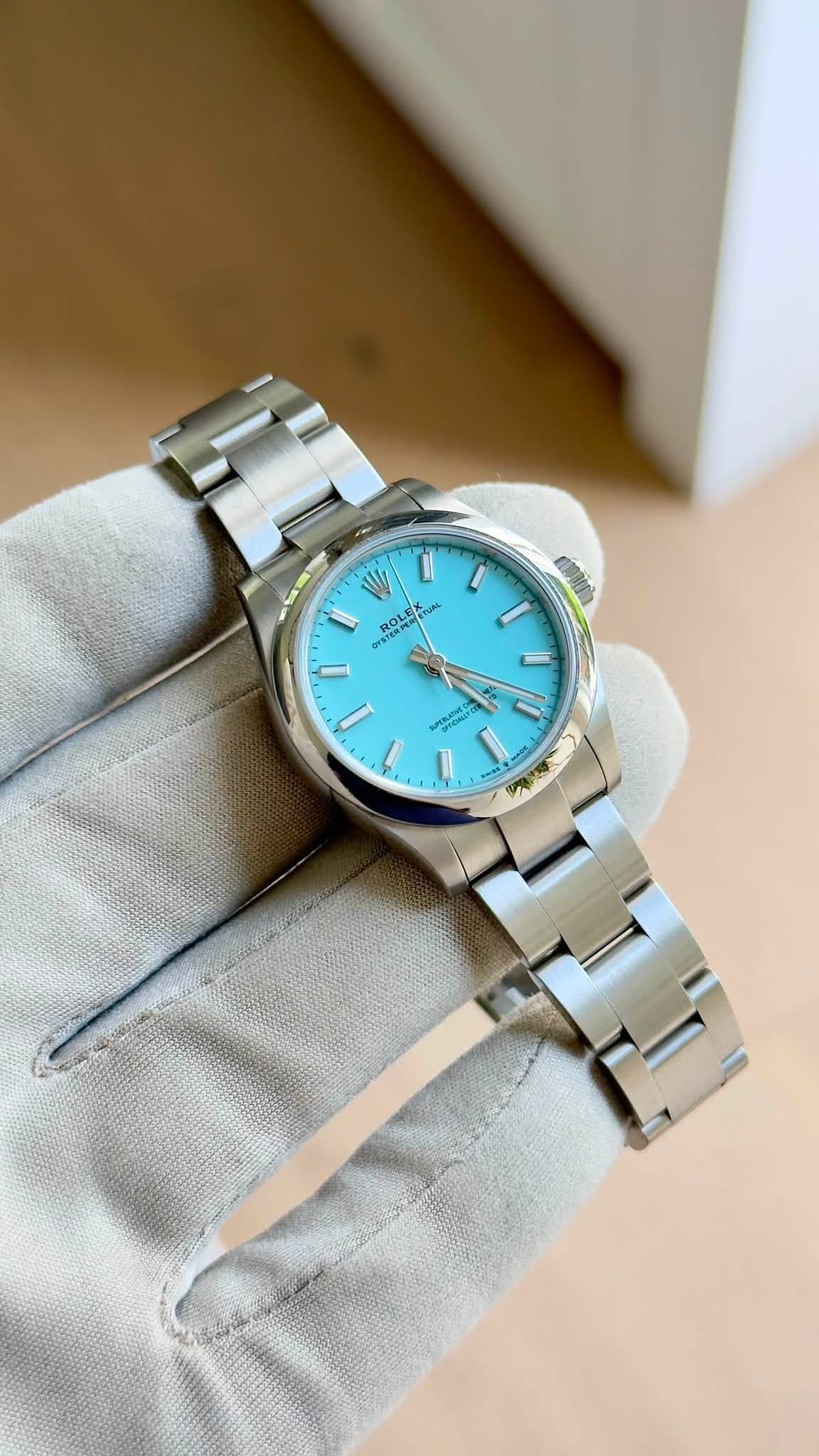 May be an image of wrist watch and text