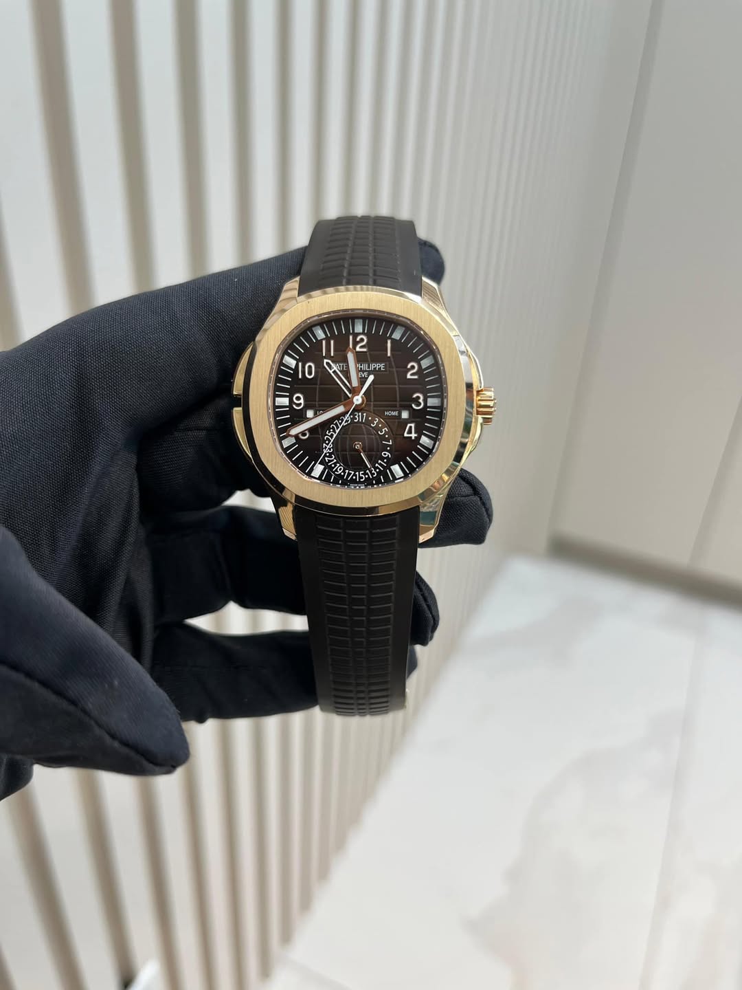 May be an image of wrist watch and text
