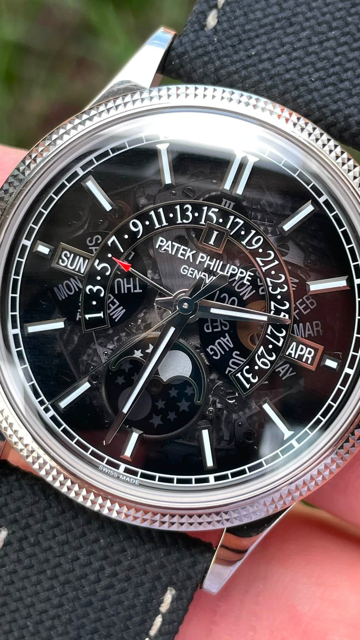 May be an image of wrist watch and text