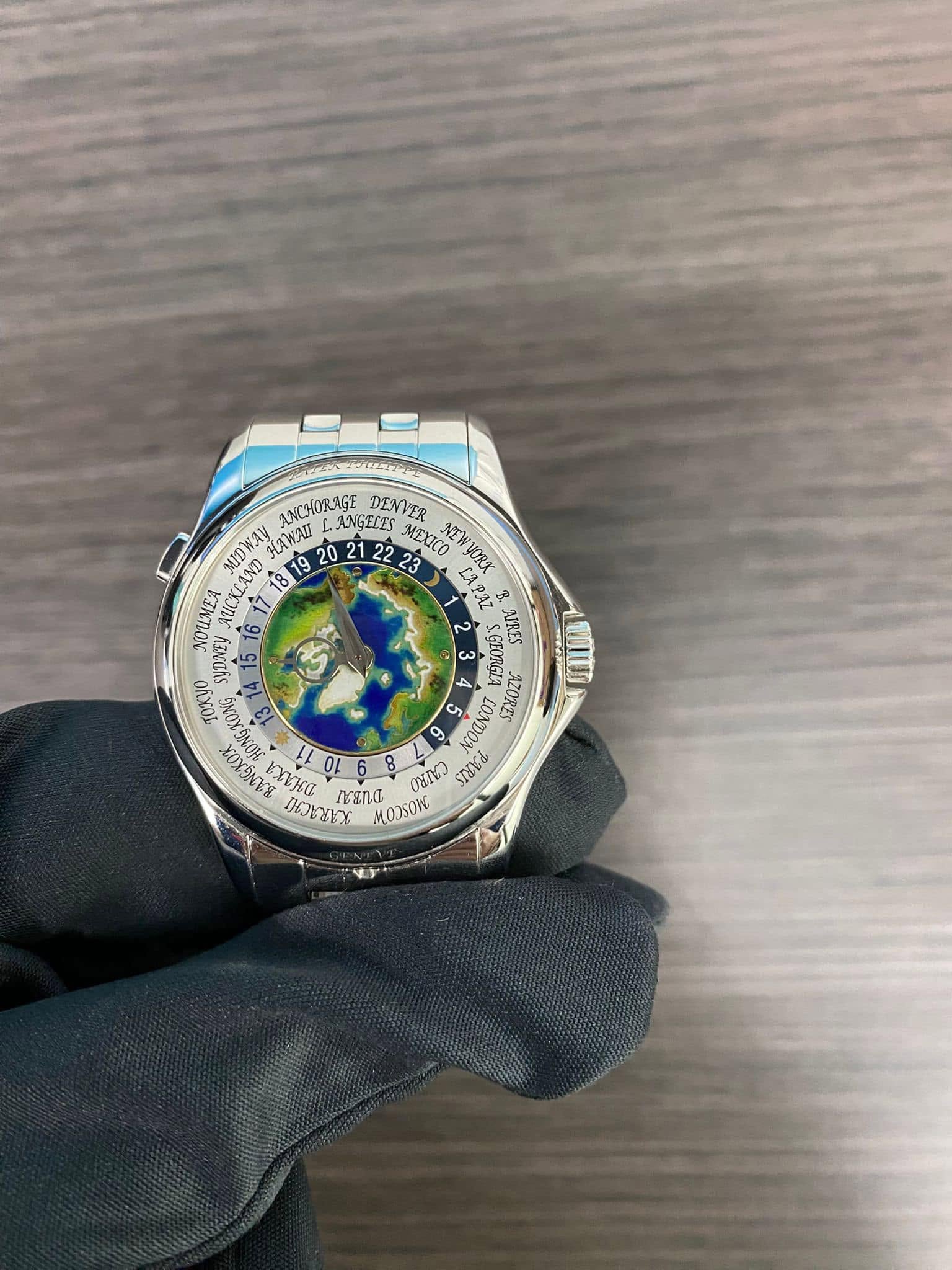 May be an image of wrist watch and text