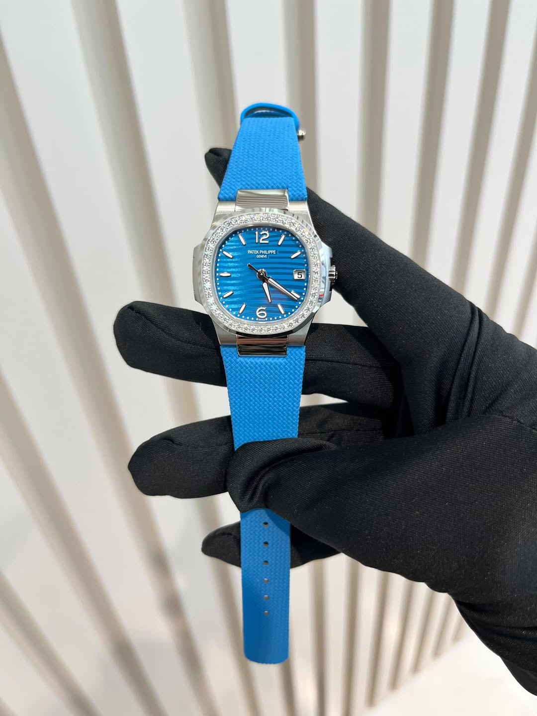 May be an image of wrist watch and text