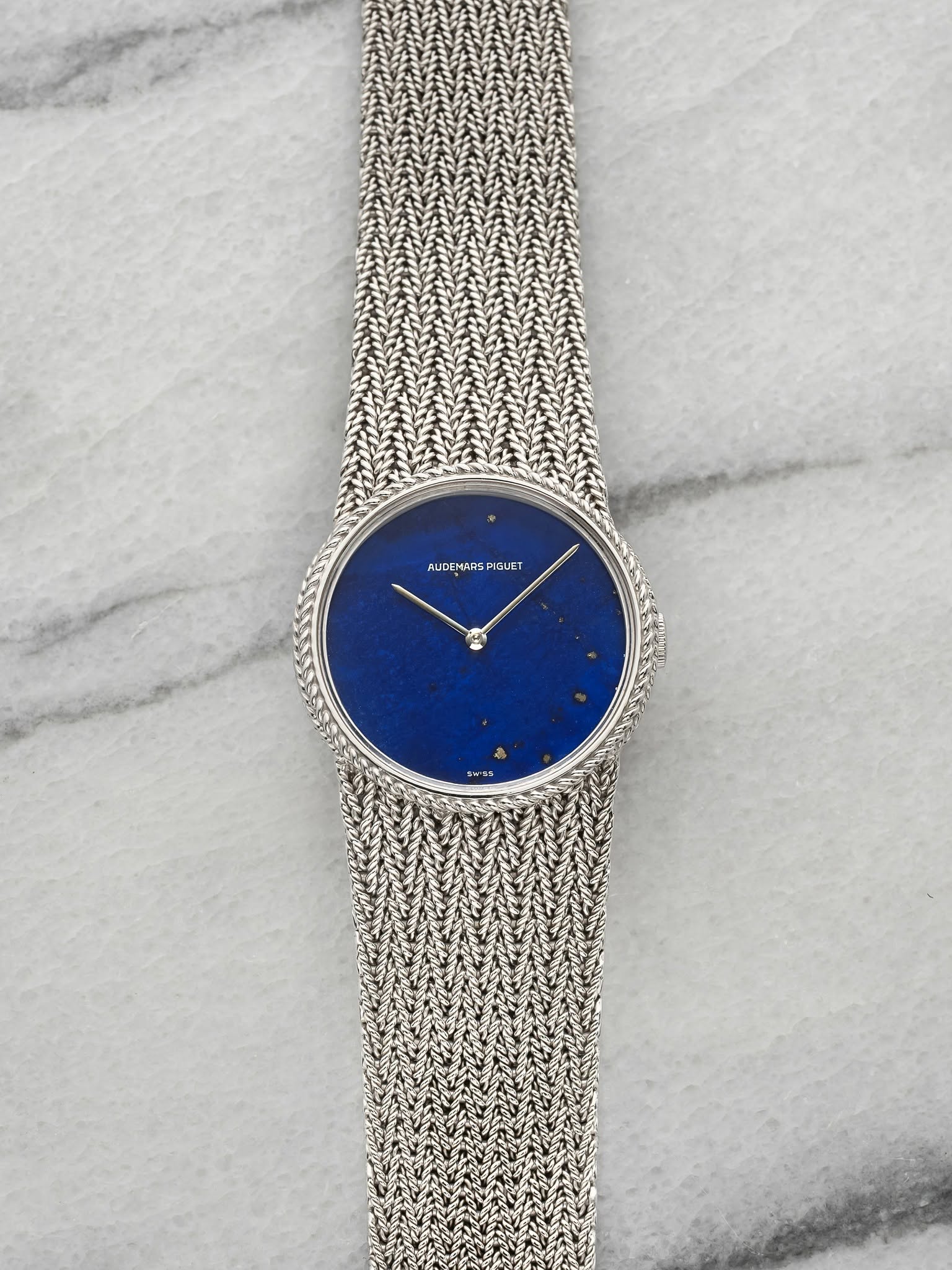May be an image of wrist watch and text that says 'AUDEMARSPIGLET AUDEMARSPIGLET M4RS PIGUET ALIDE'