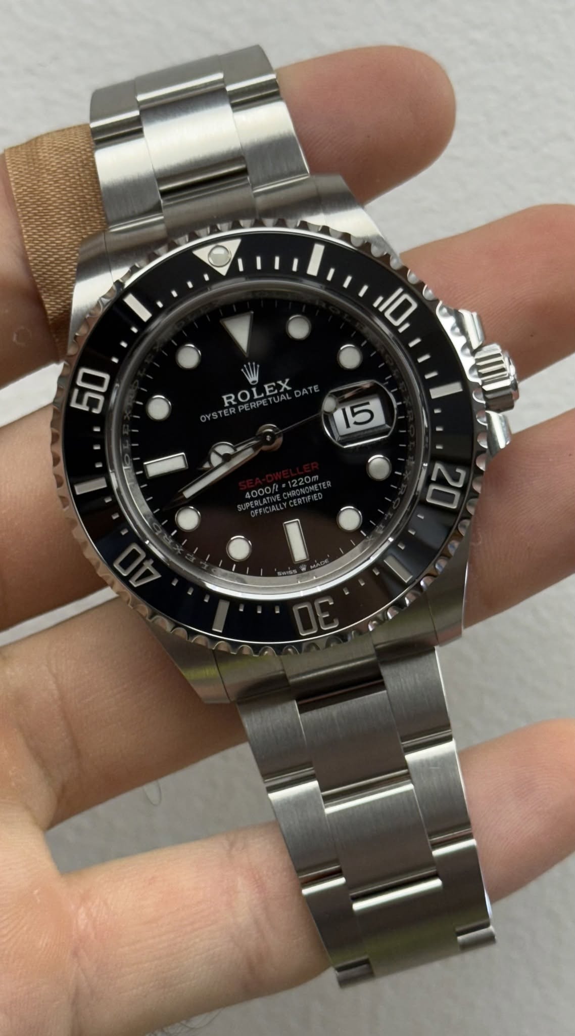 May be an image of wrist watch and text that says '10 50 ROLEX '