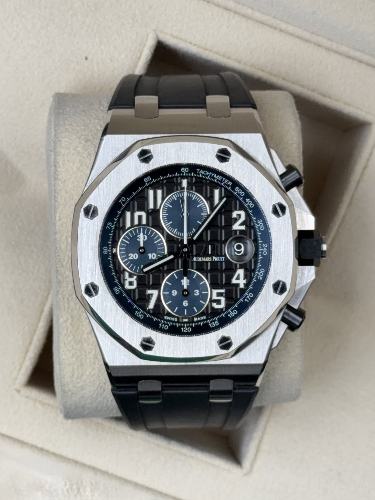 May be an image of wrist watch and text