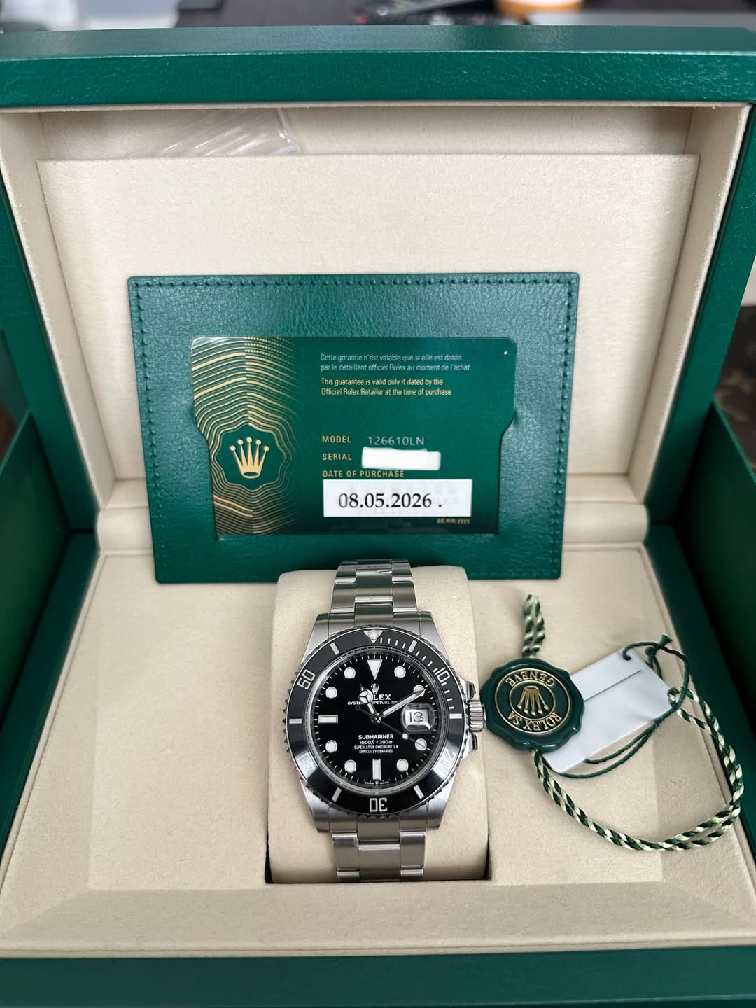 May be an image of wrist watch and text