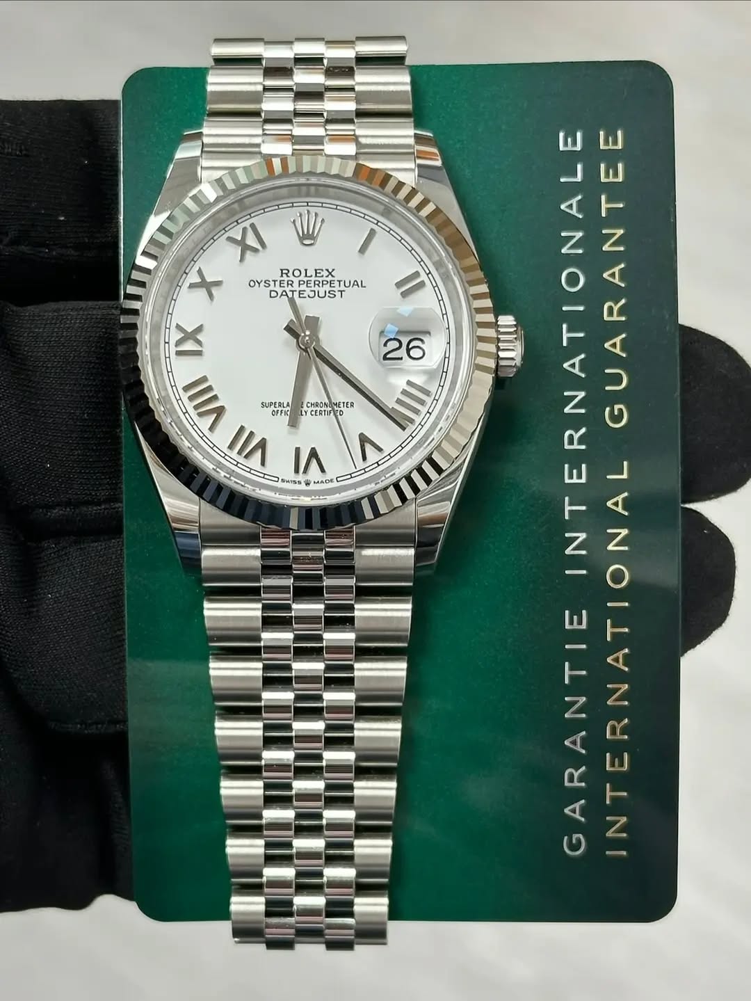 May be an image of wrist watch and text that says 'Χι X ROLEX OYSTERPERPETUAL RPERPET OYSTE OYSTERPER ERPETUAL TUAL DATEJUST DAT IX VIII SUPERLA OFFI VII BuISS MADE 26 CHRONIMETER…