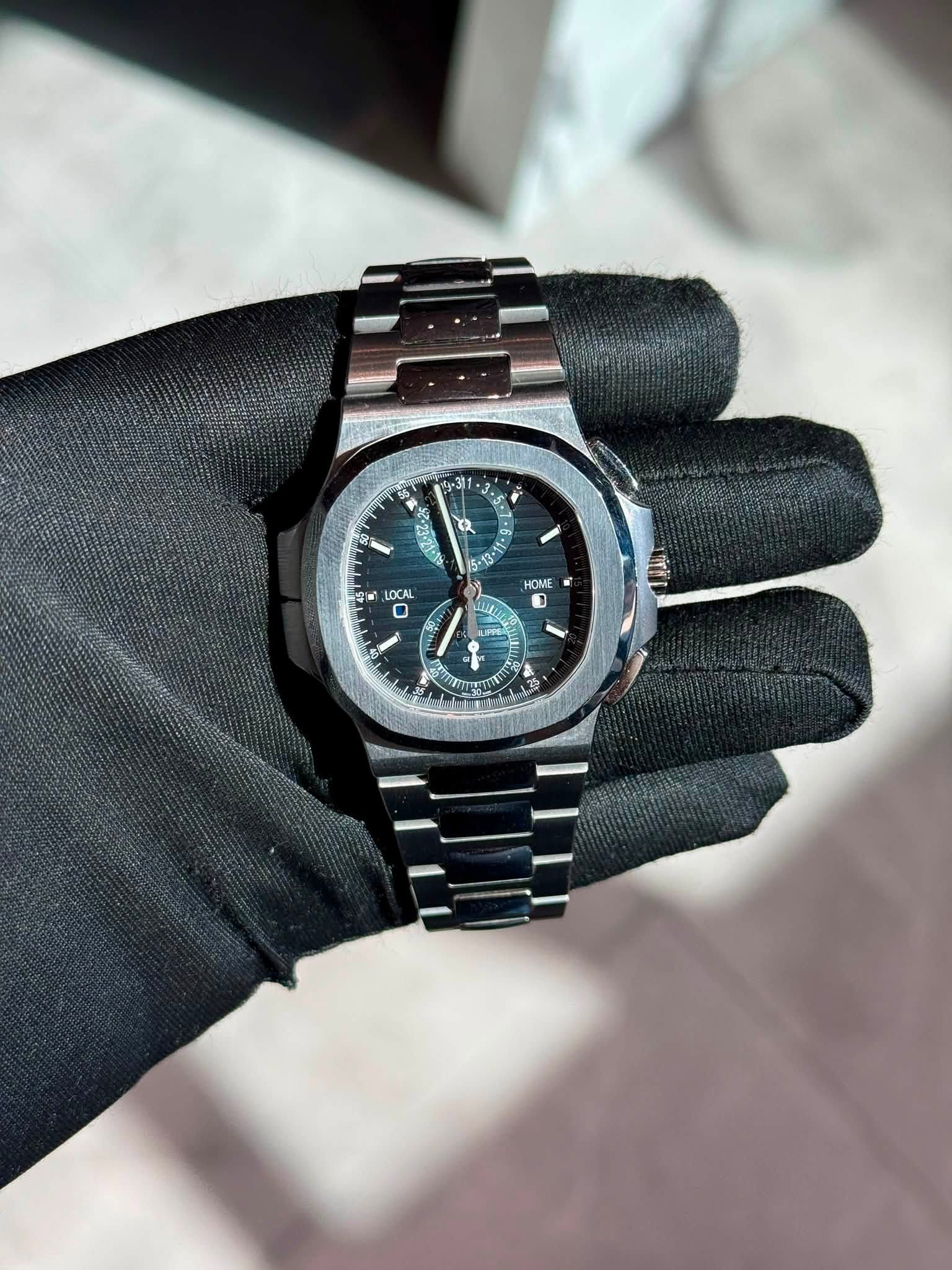 May be an image of wrist watch and text that says '•3 風 盛 3근 23-21 ን302 a ዓ LOCAL HOME 1 11 A LIPF ب ستن 53 中'