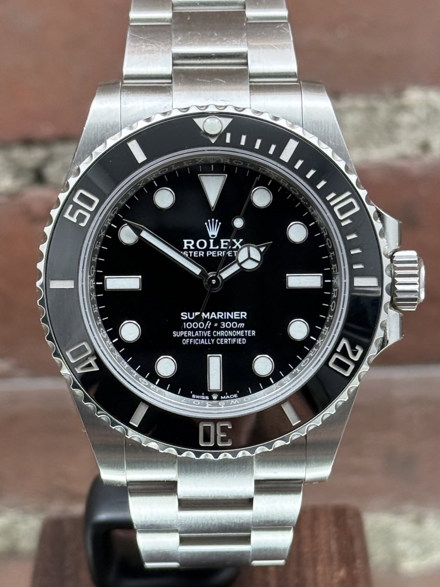 May be an image of wrist watch and text that says '50 ROLEX ASTER PERFET STERPERFET ET FE 10 I 40 SUFMARINER SUP MARINER 1000ft 300m SUPERLATIVE CHRONOMETER SUPERLATIVECHRONOMETER…