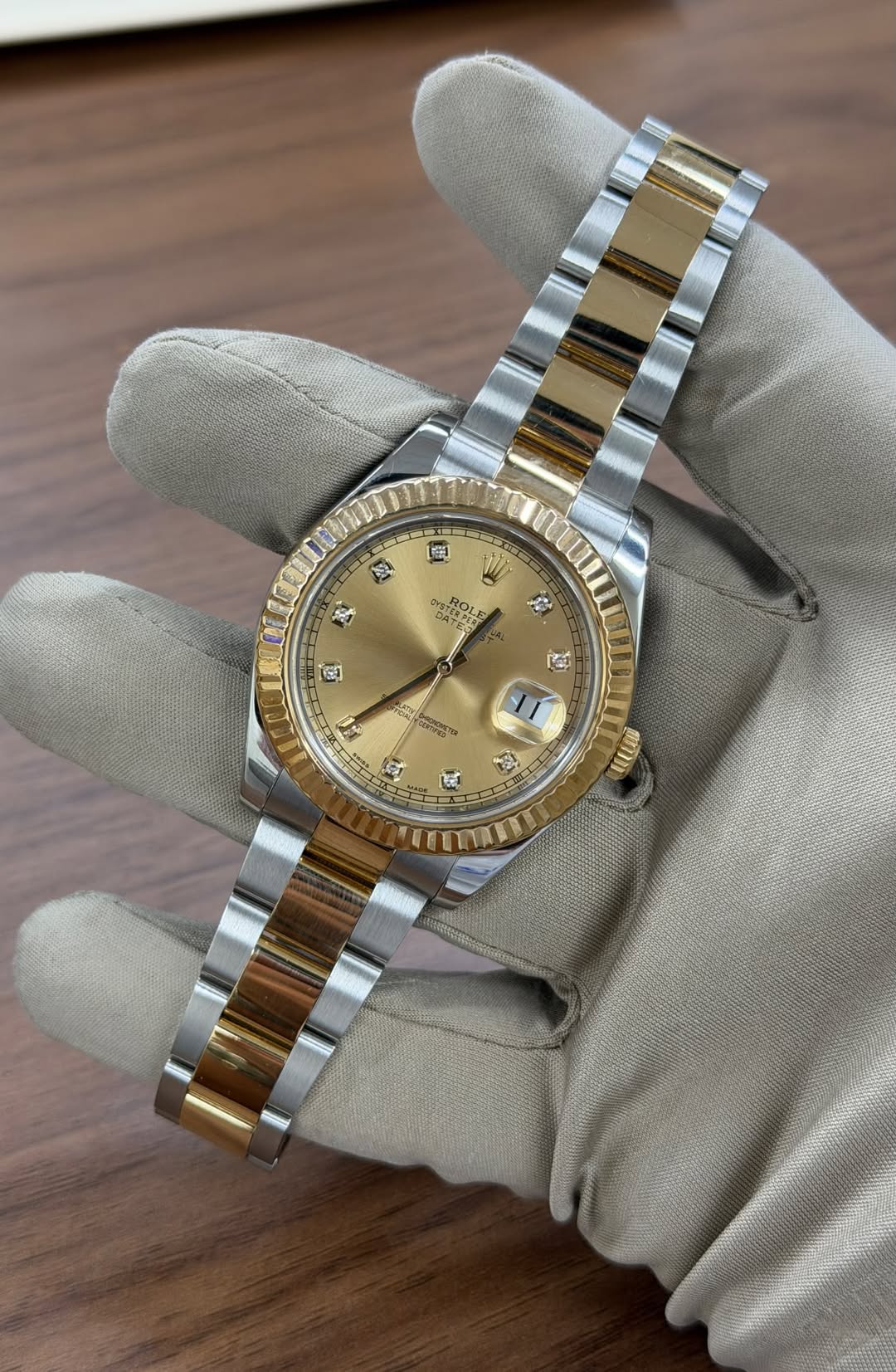 May be an image of wrist watch and text
