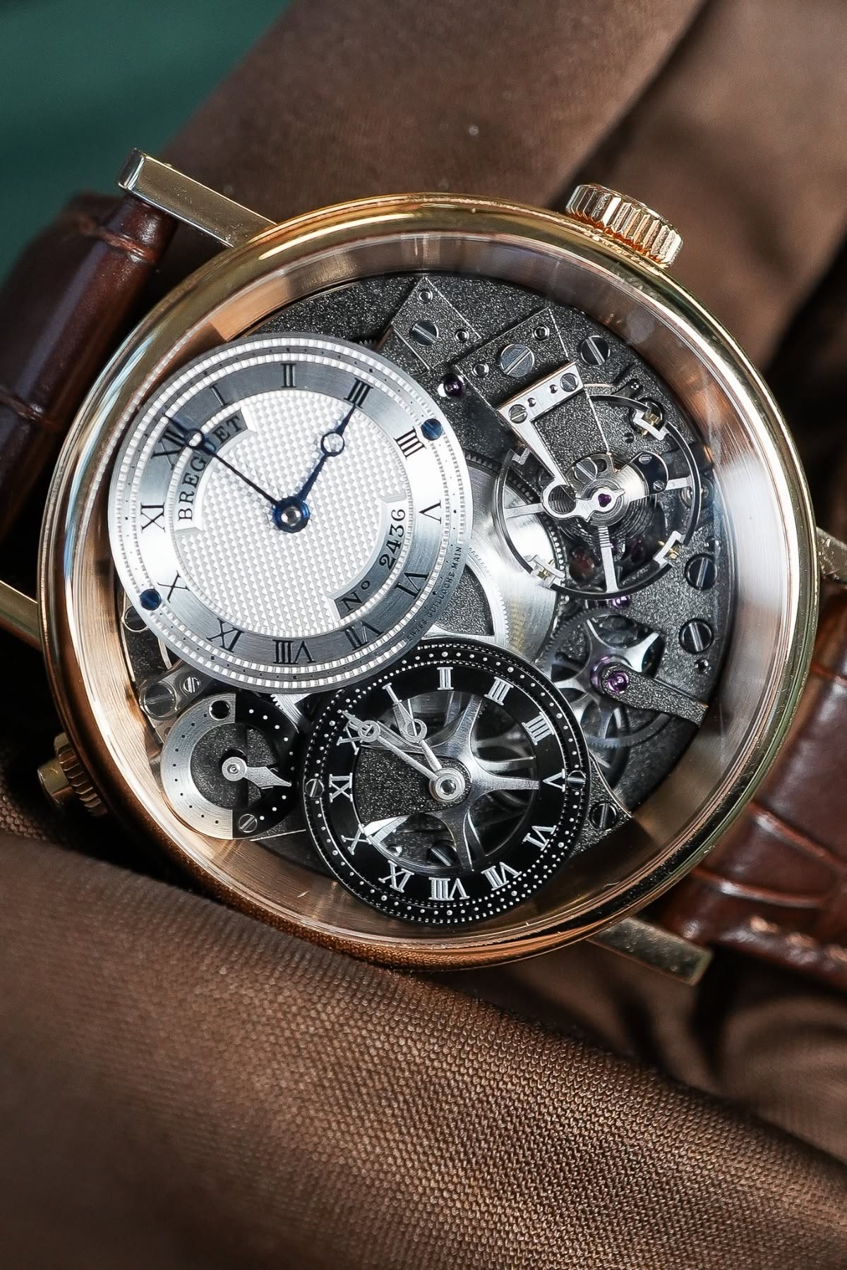 May be an image of wrist watch and text