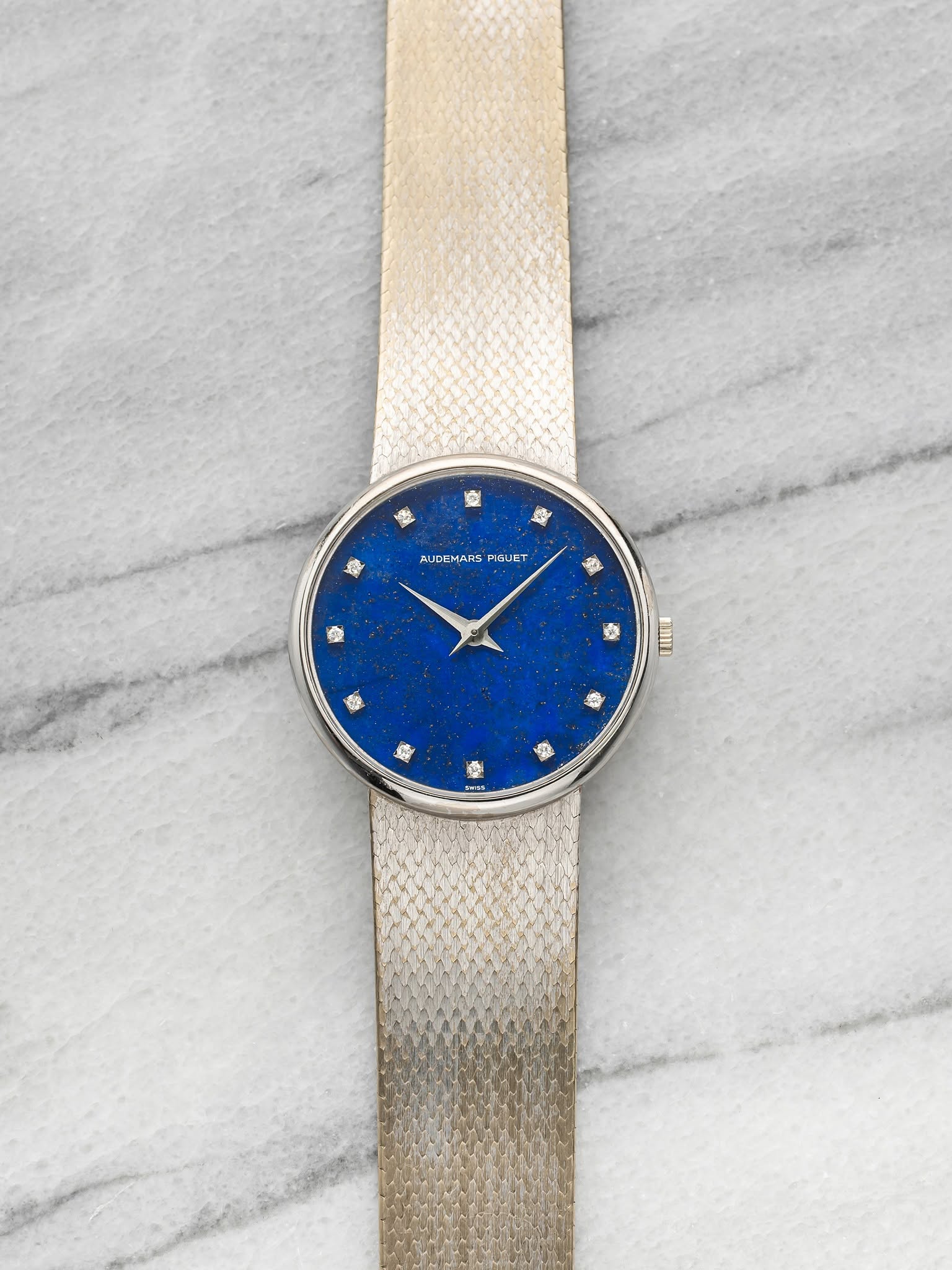 May be an image of leather and wrist watch