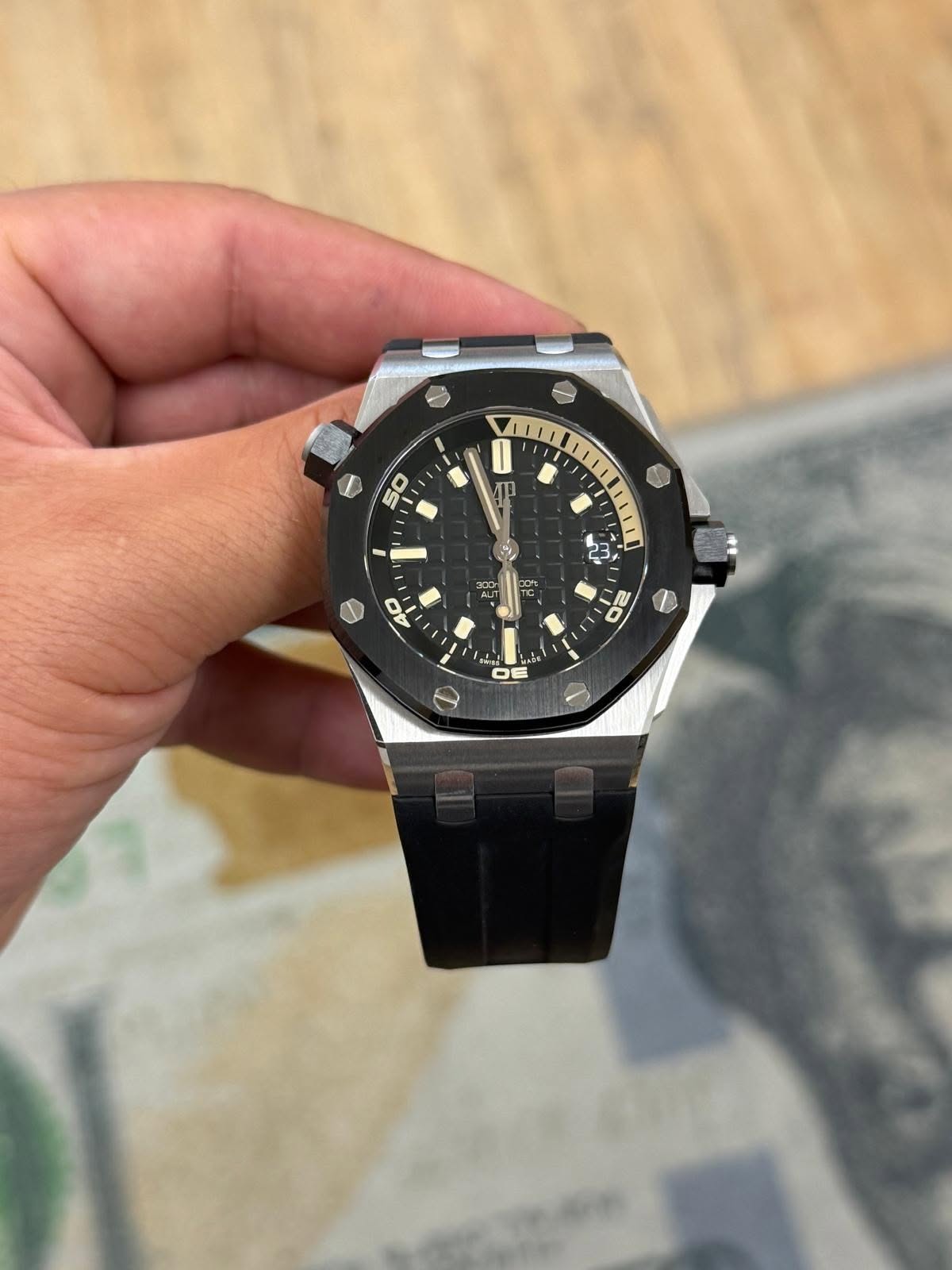 May be an image of wrist watch and text