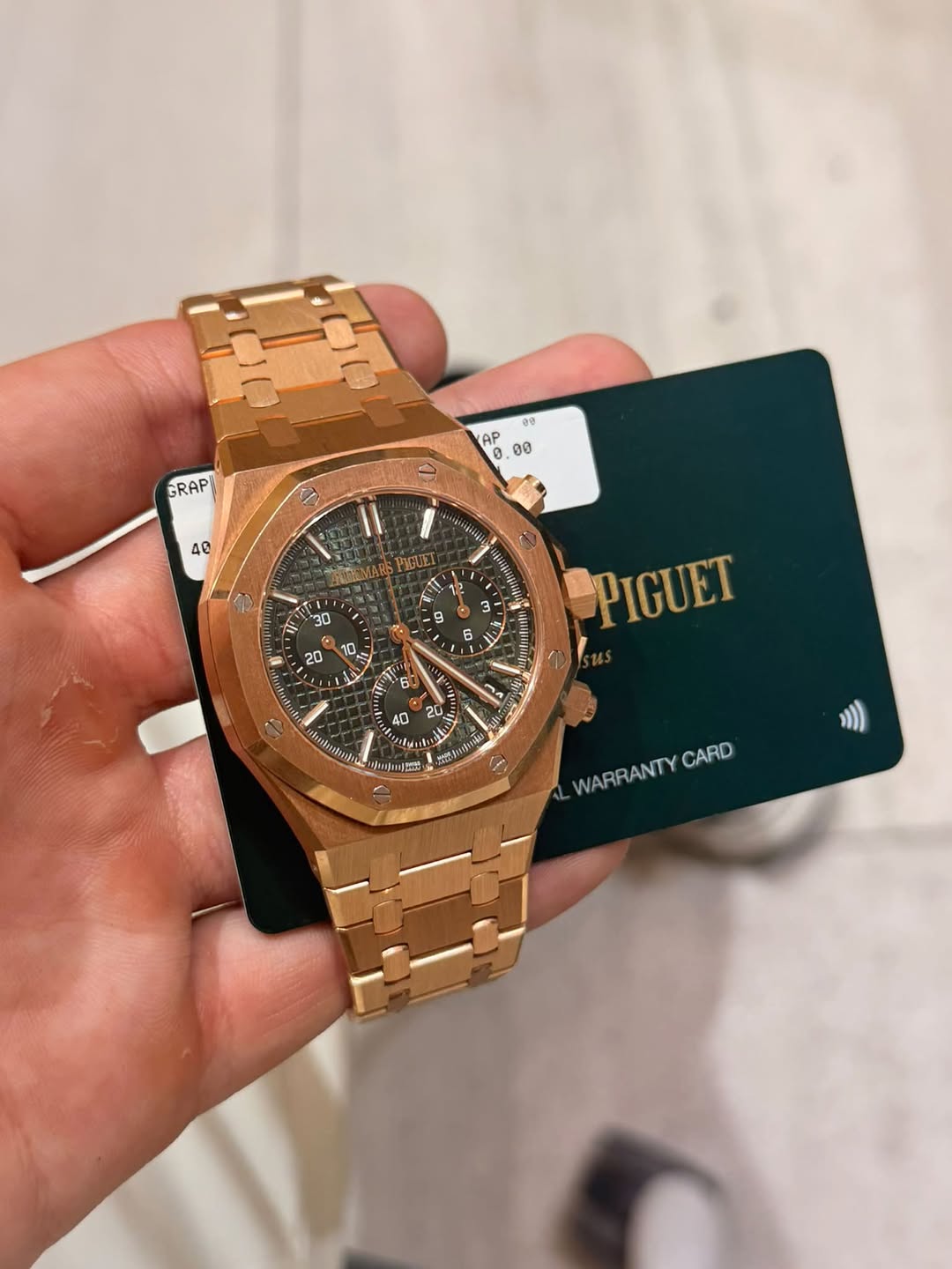 May be an image of wrist watch and text