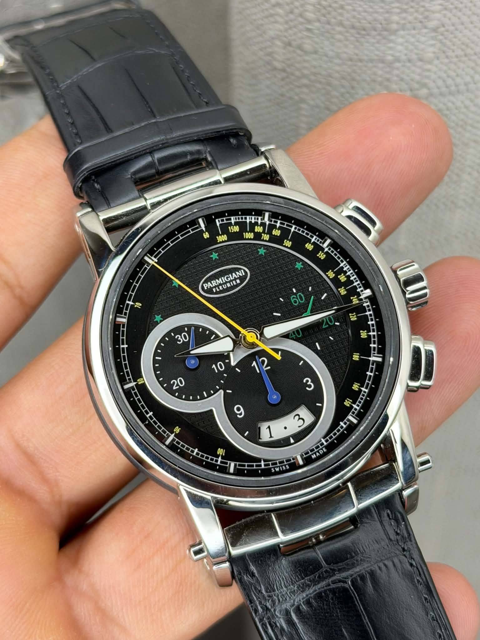 May be an image of wrist watch and text that says 'μαлψu 红工 * PARMIGIANI FLEURIER 10 * 金 امكلم 6 LIII 1 3 081 EIL MADE SWISS'