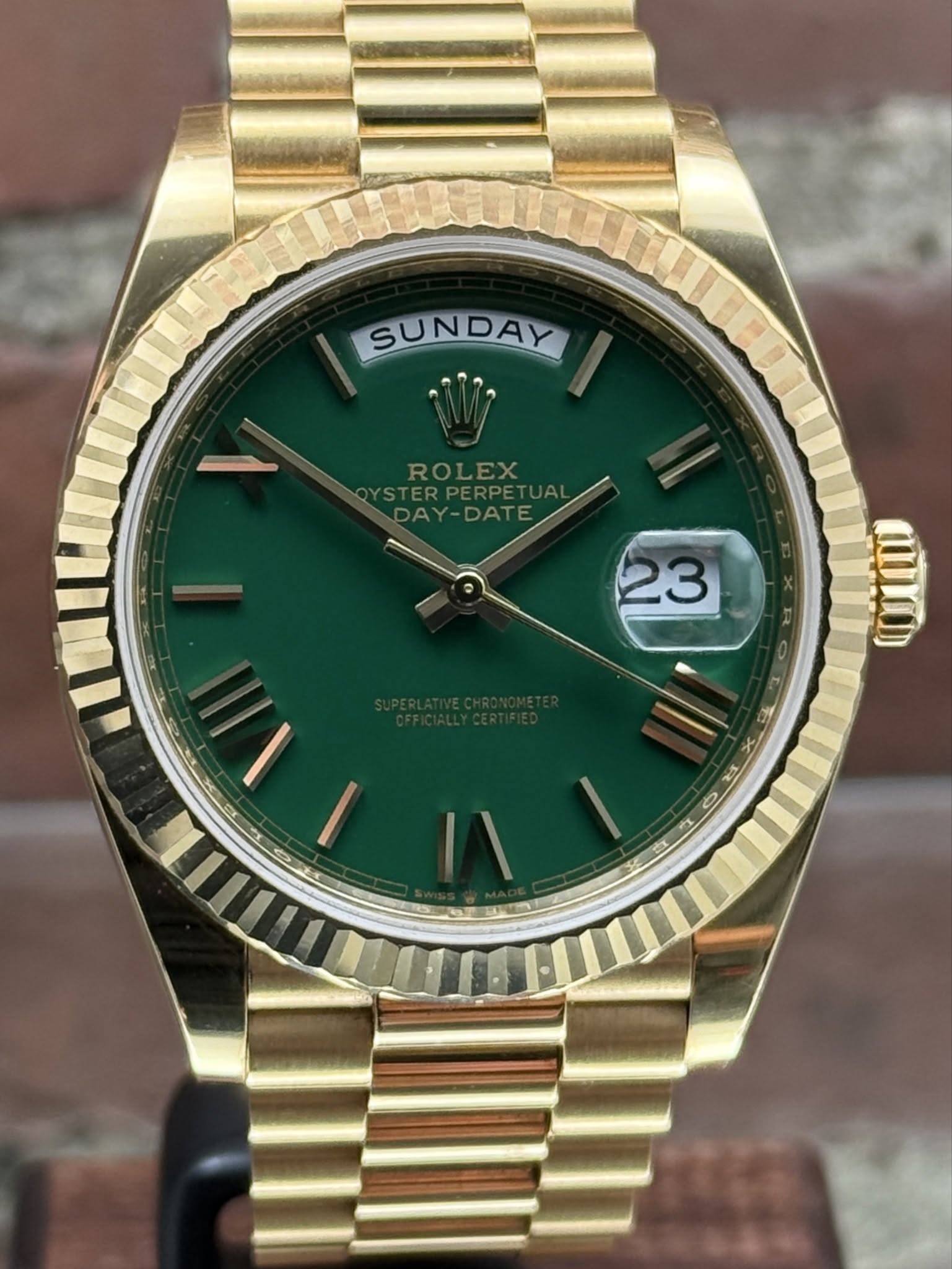 May be an image of wrist watch and text that says 'SUNDAY ROLEX YSTERPERA OYSTERT STERPERPETUAL RPERPETUA DAY-DATE 23 3 25'
